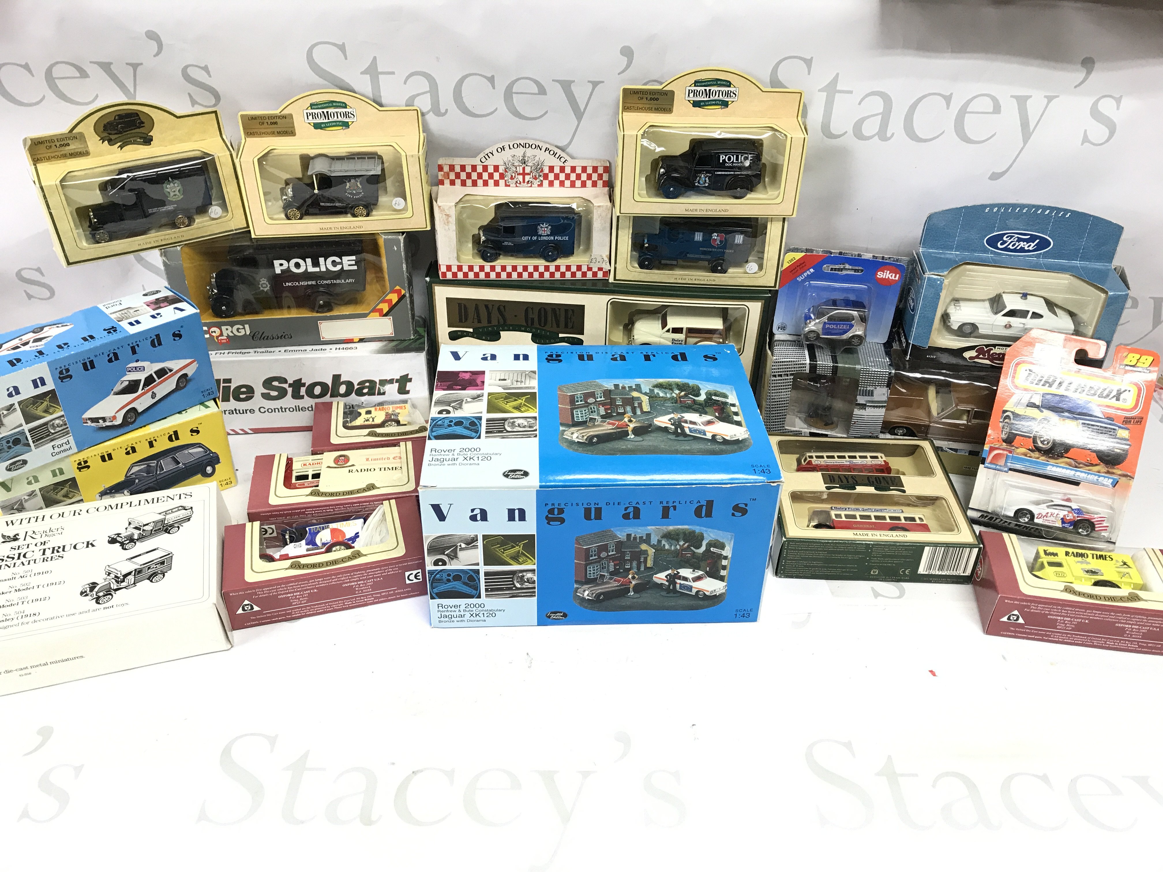 A collection of assorted die cast vehicles including Vanguards Corgi classics and matchbox etc. Postage B