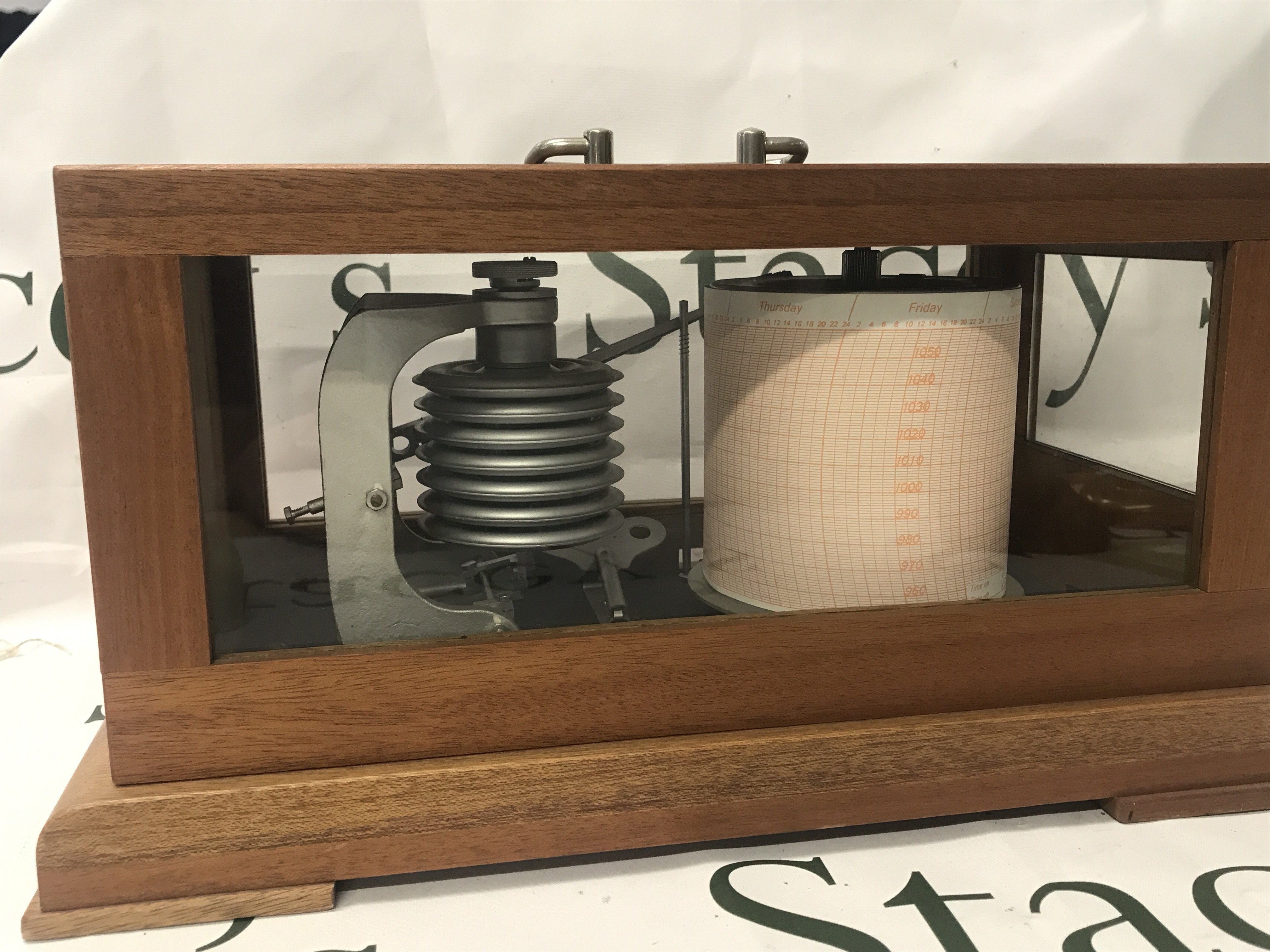 A cased barograph , veb feingeratebau 9362 drebach. 35cm wide 18cm tall