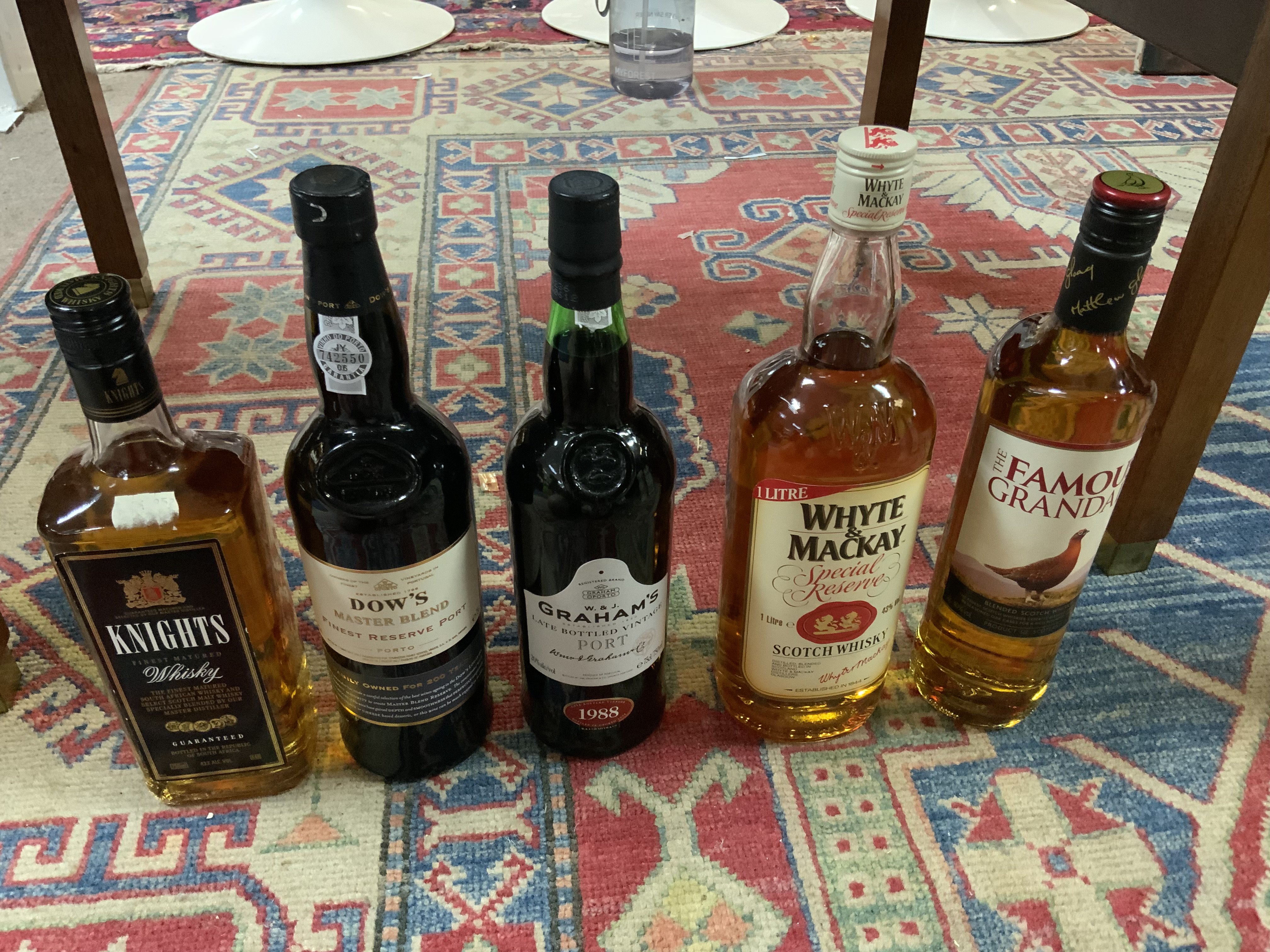 A good collection of whisky&#2013266066s to include Gragganmore, Oban, Jim Beam etc plus 2 bottles of vintage port.