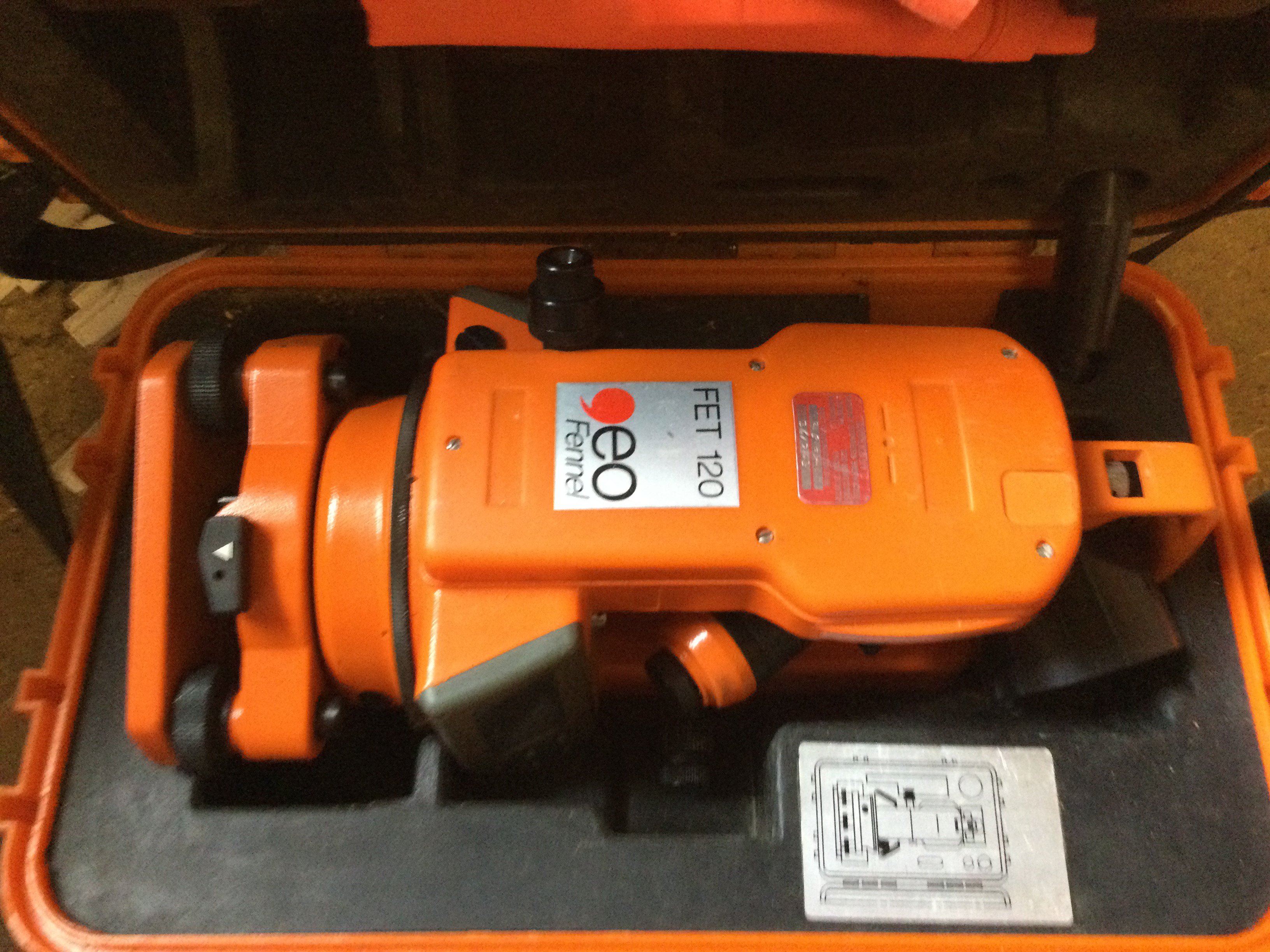 A Geo Fennel FET Theodolite with carry case and stand. Items sold in situ. Viewing on location in Woodham Mortimer by appointment contact office to arrange.