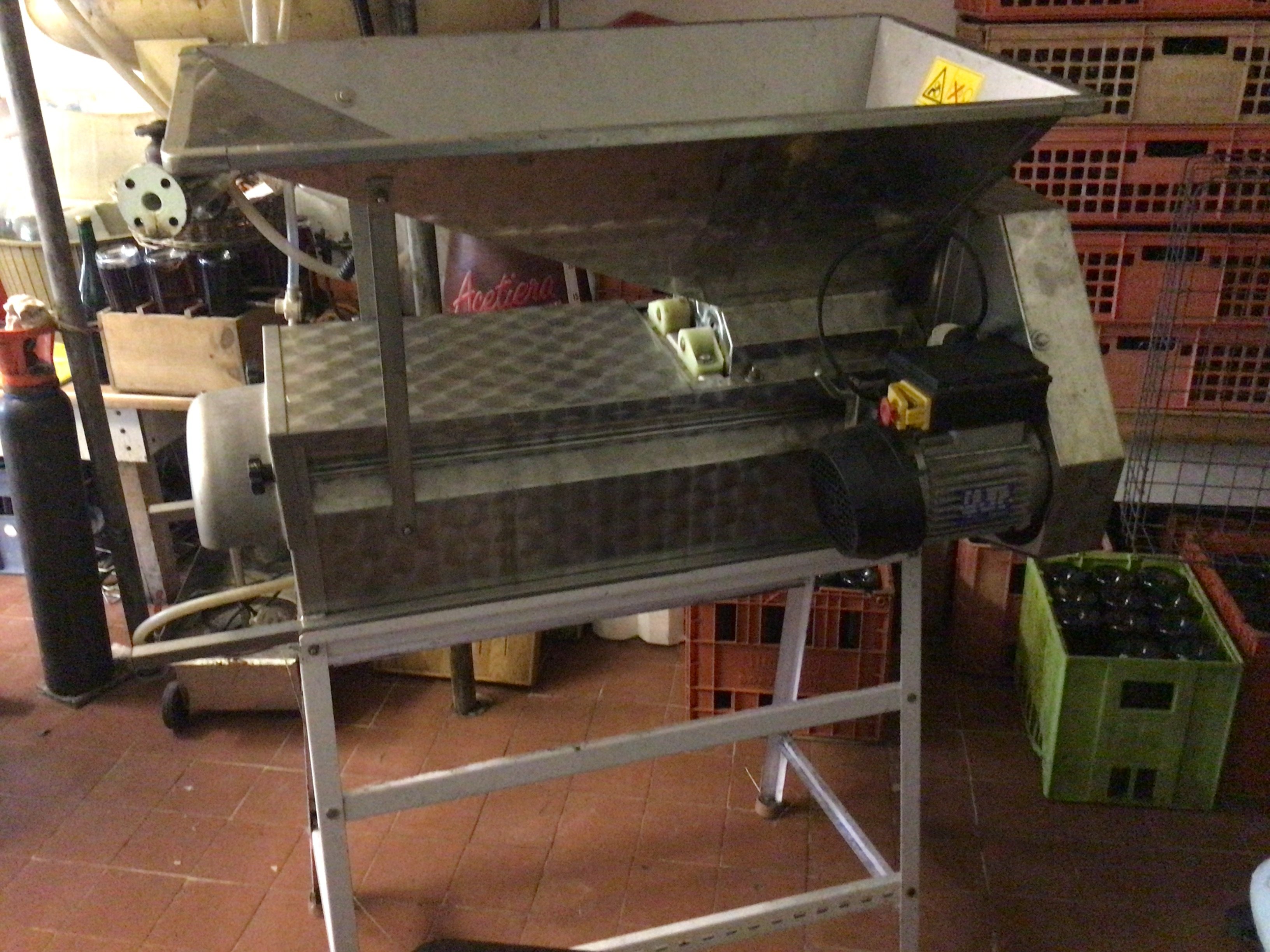 A Galvanised grape masher with stalk extractor electric operated seen working. Viewing by appointment sold in situ buyer to collect.