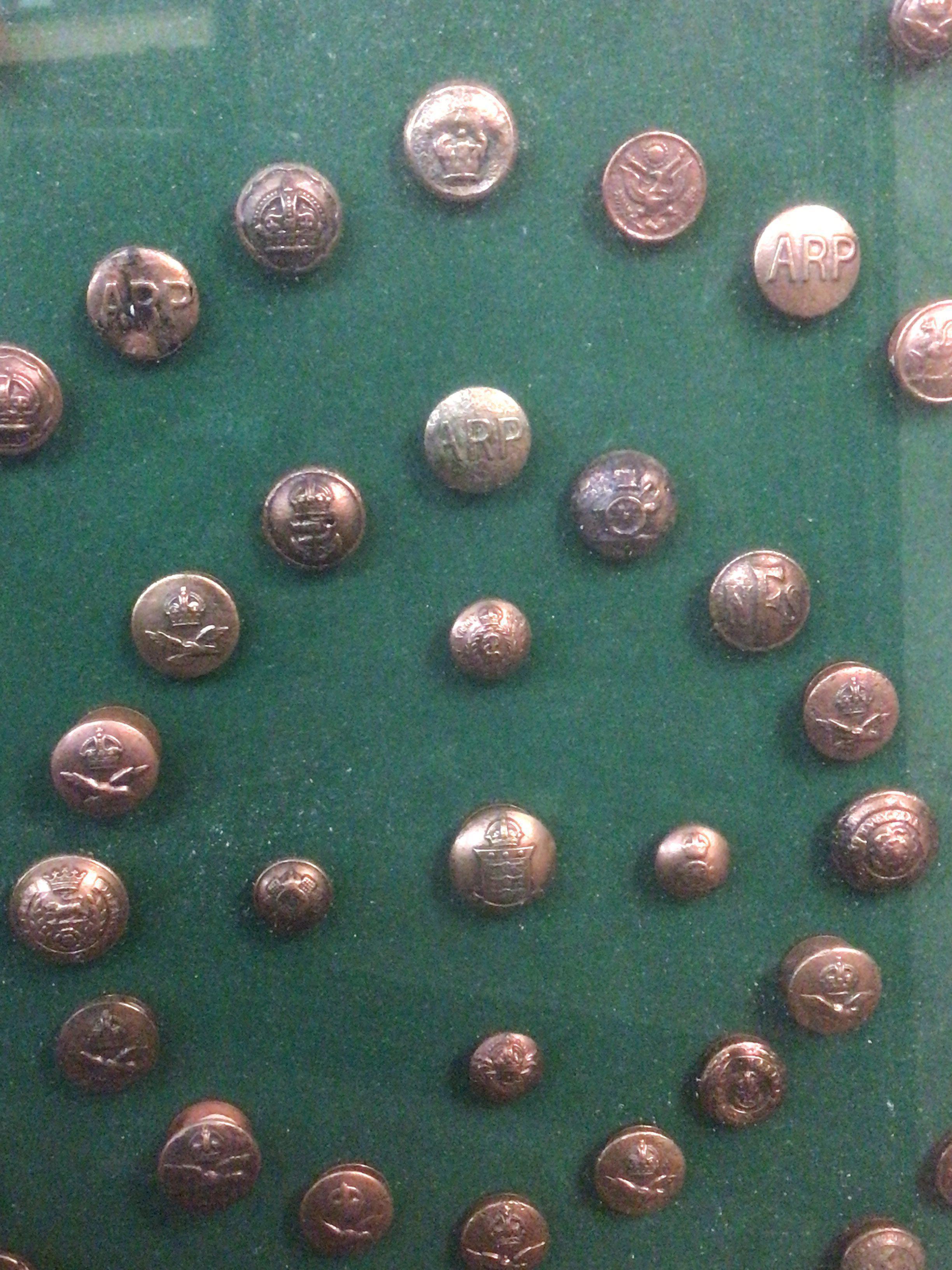 A case containing military buttons. This lot cannot be posted