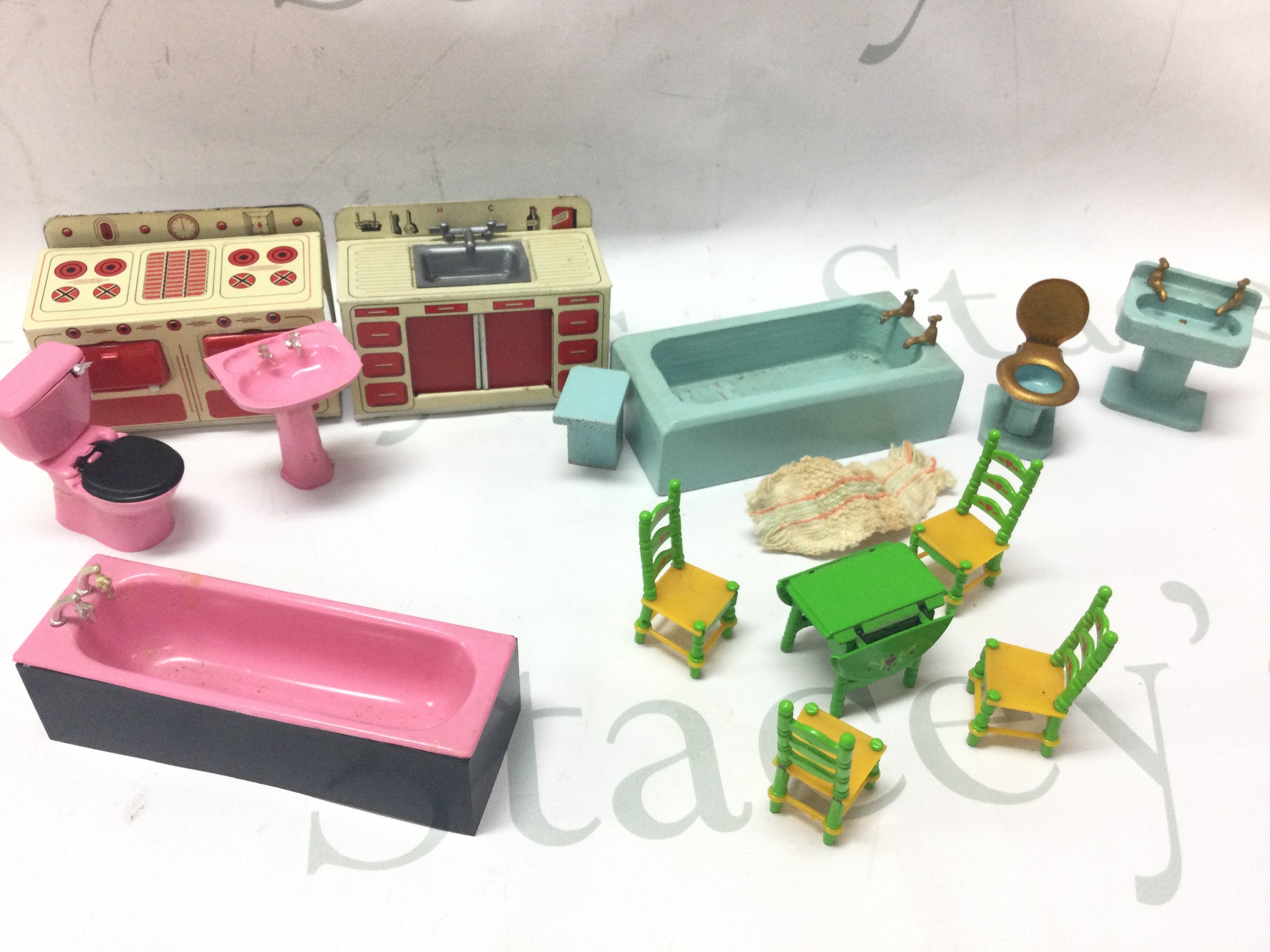 Tin plate and wooden dolls house furniture and items including Mattel table and chairs.