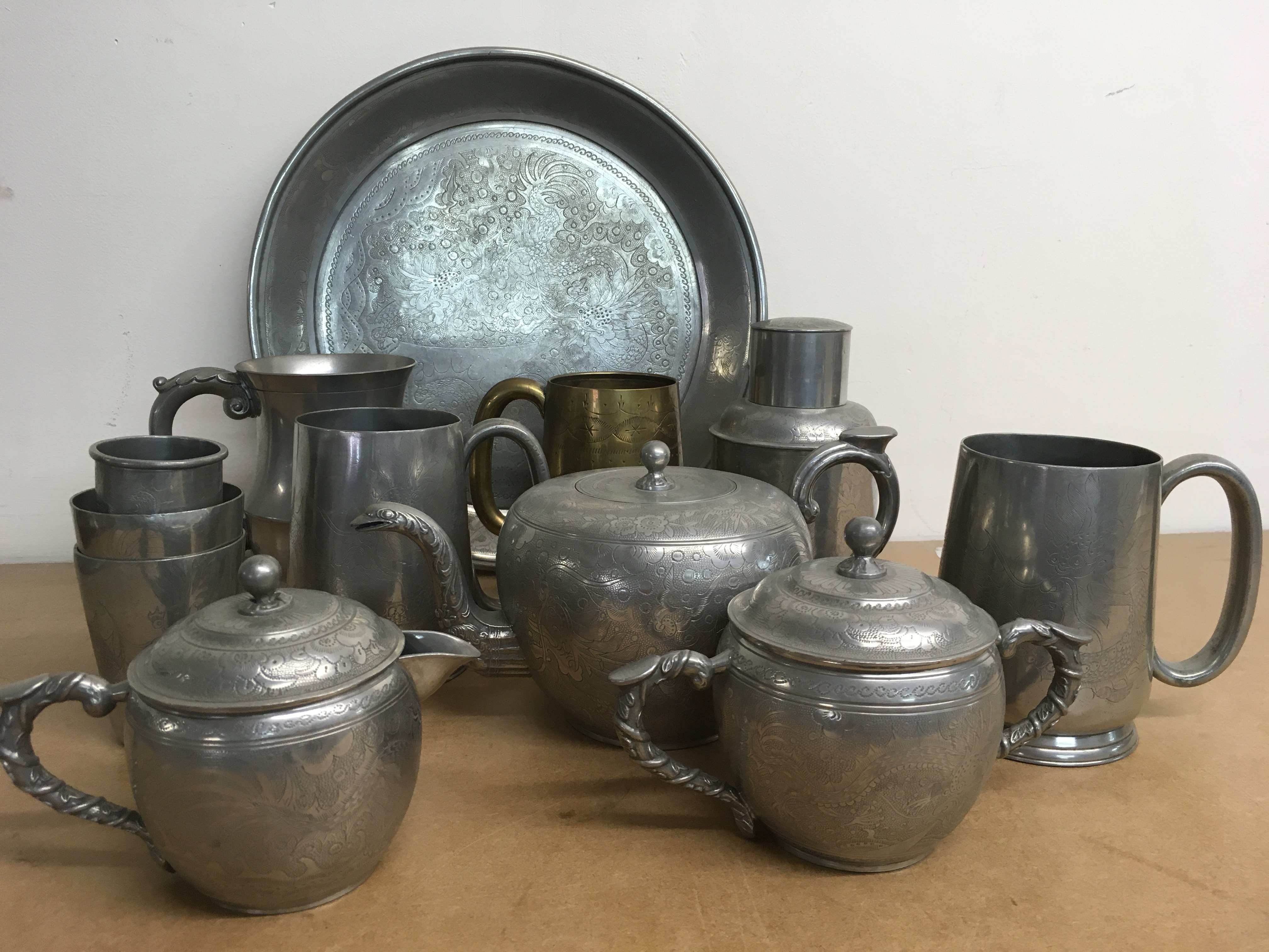 An inlaid wooden tray decorated with real butterfly wings