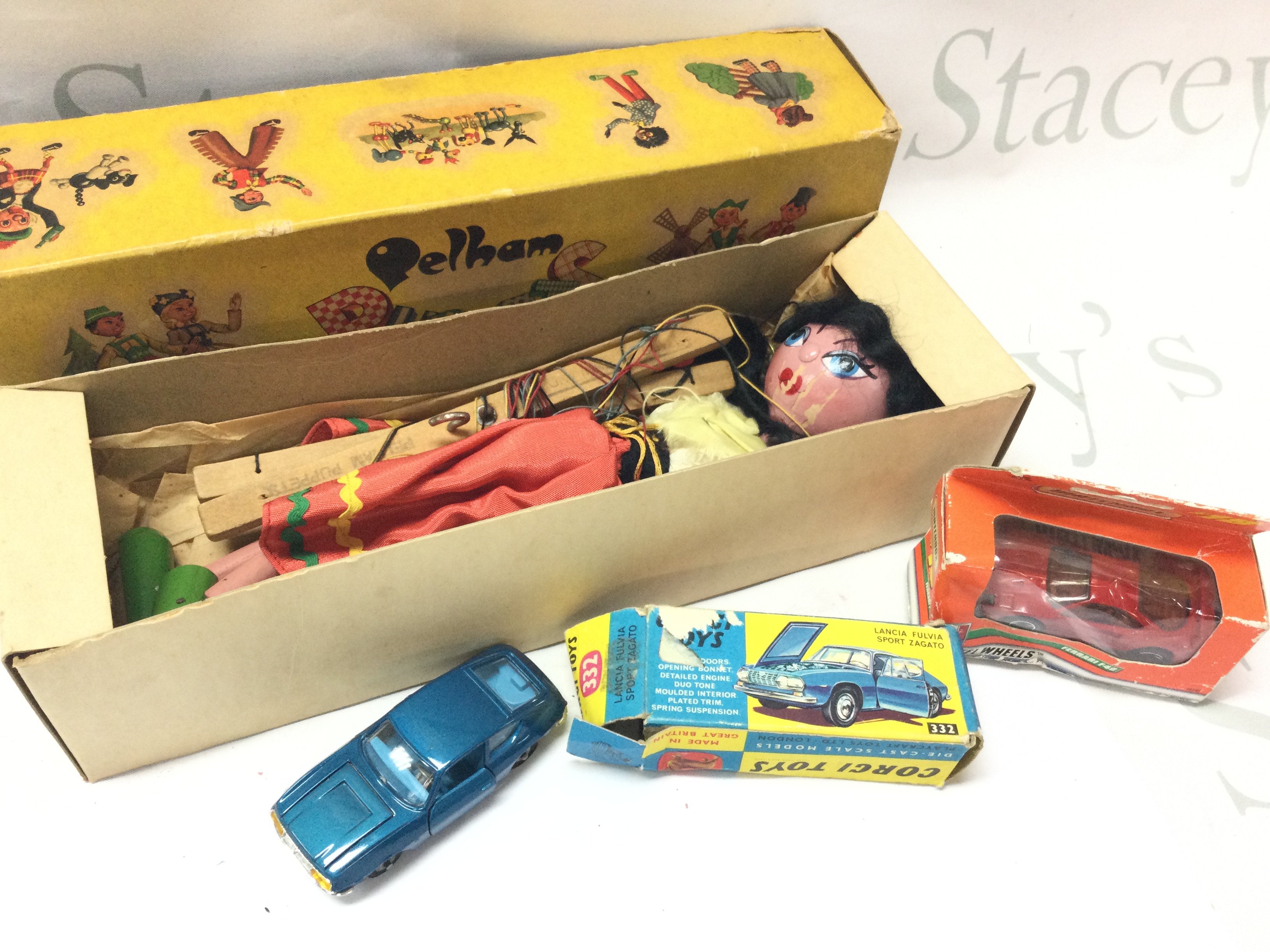 A boxed Pelham puppet SS Gypsy, boxed Corgi Lancia Fulvia sport zagato, boxed Matchbox Ferrari F40. Postage category B