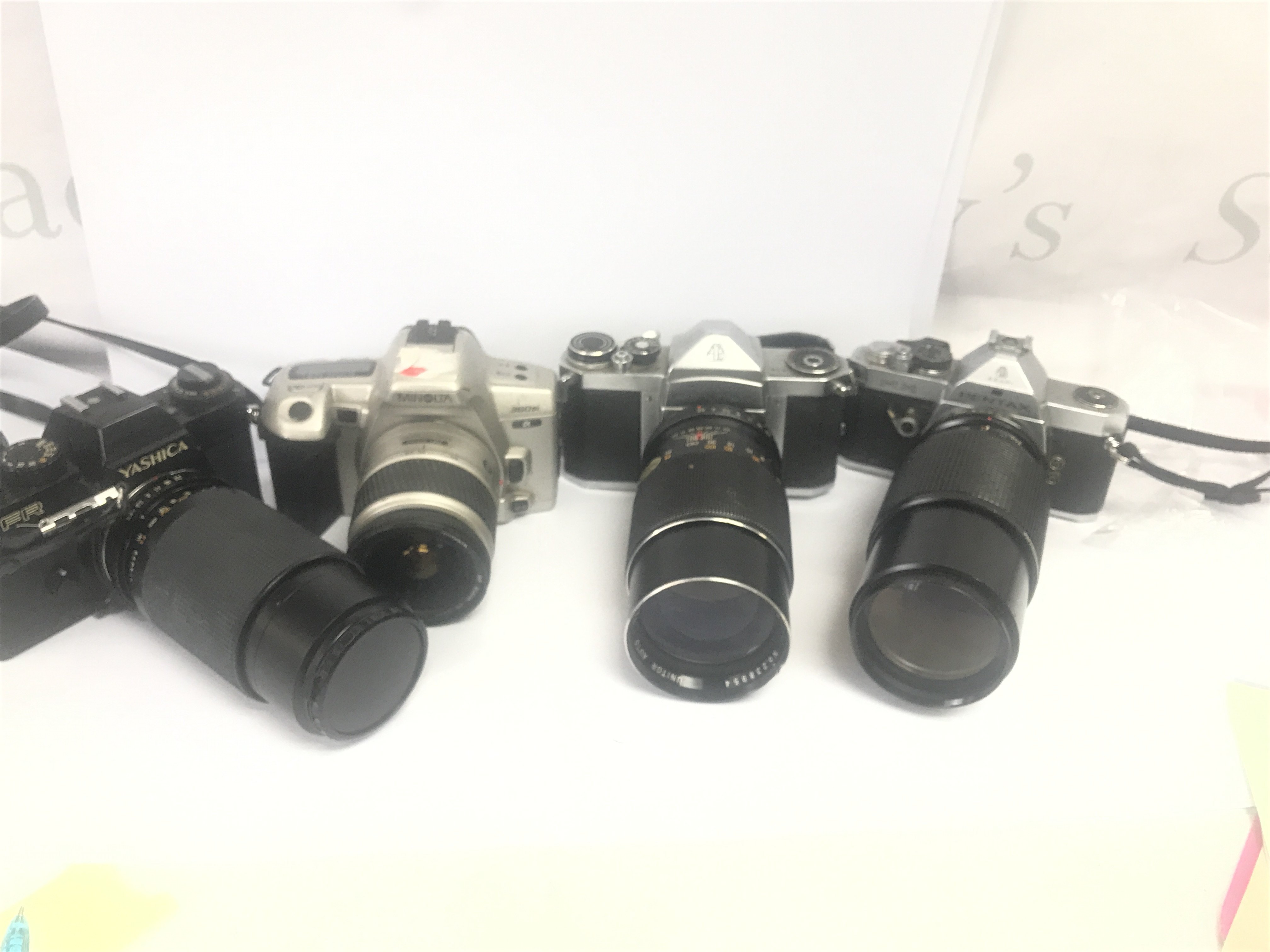 4 Cameras including Pentax, Yashica, Minolta