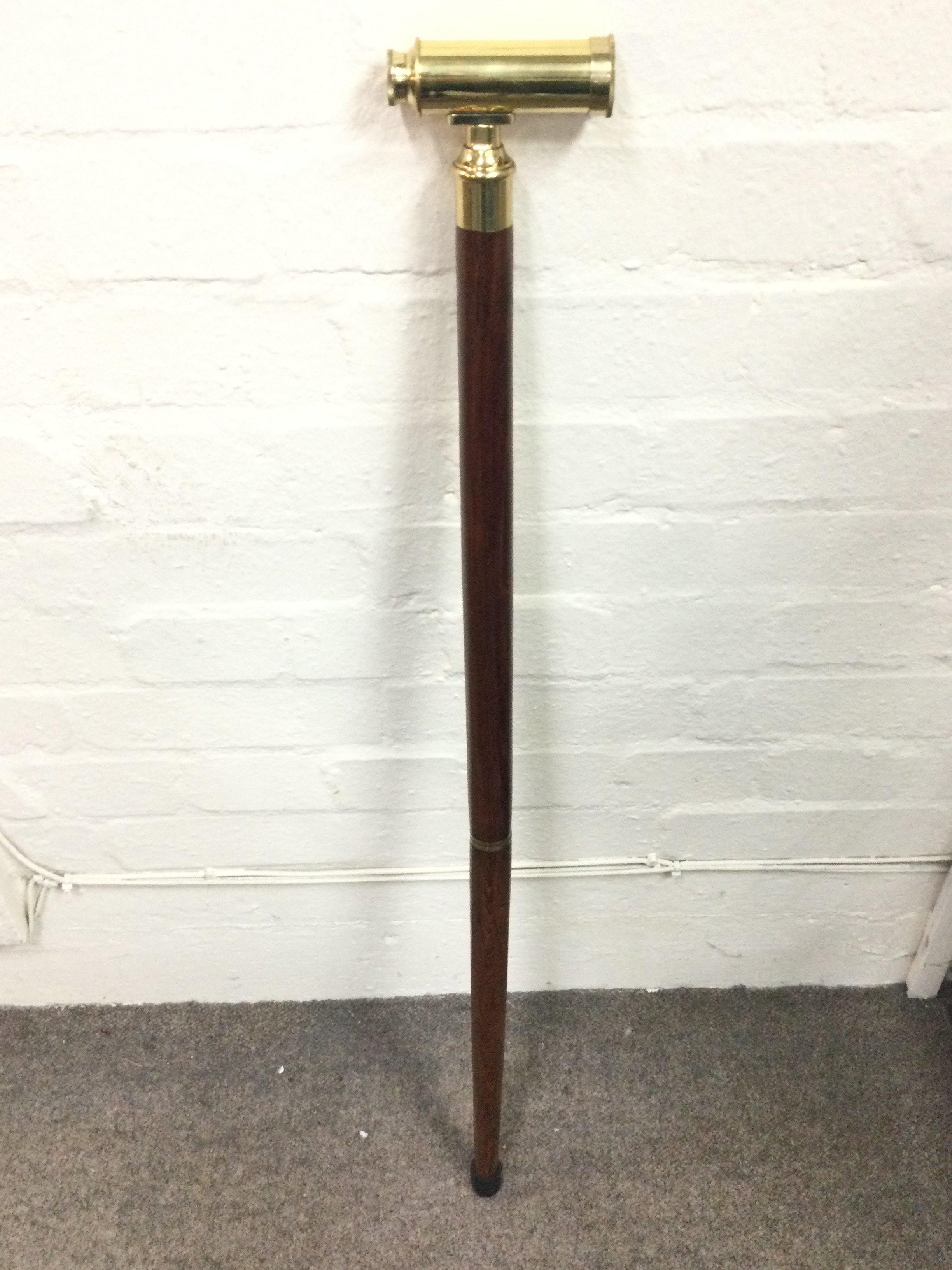 Walking stick with novelty telescope top. 90cm long.