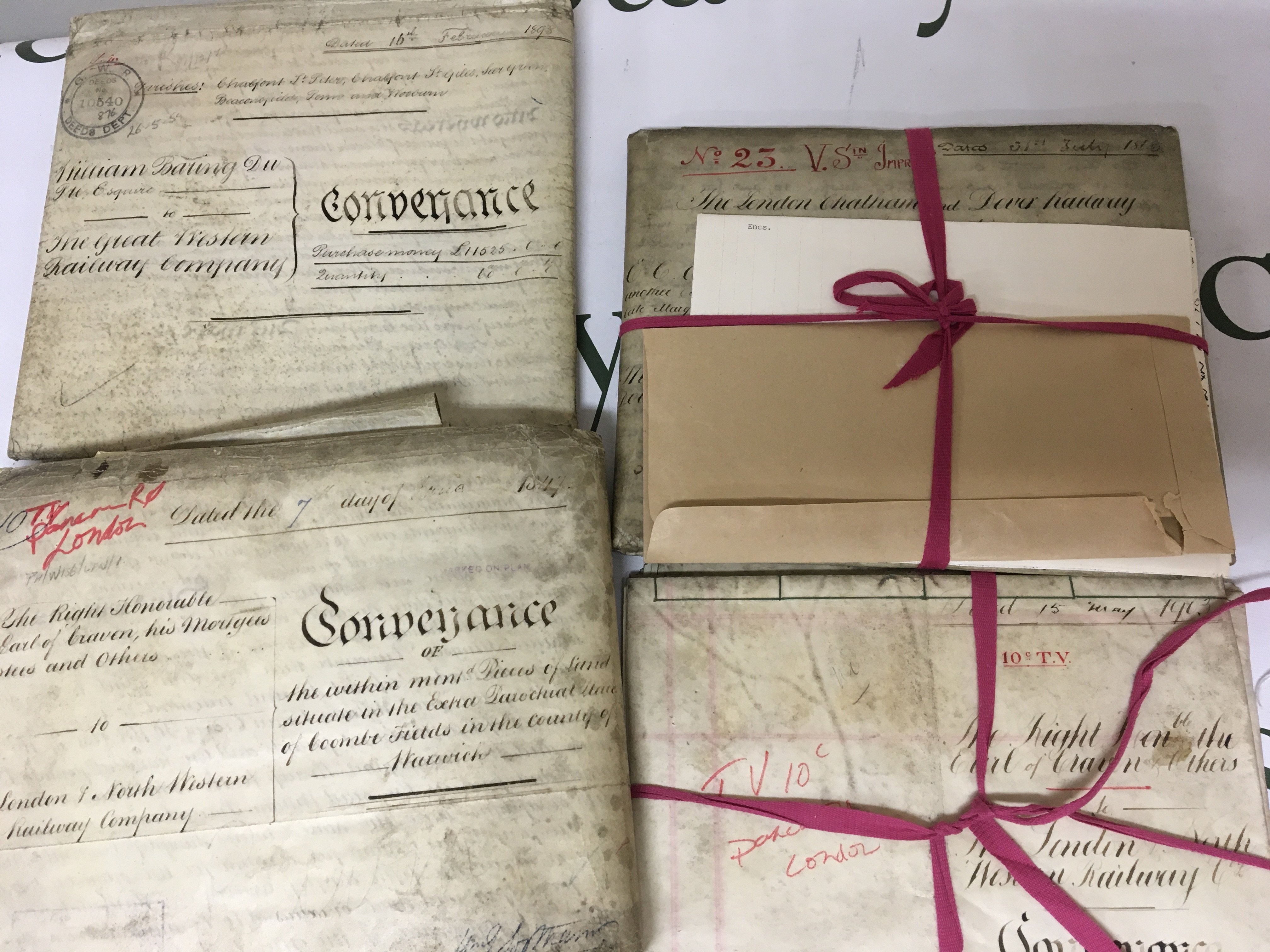 A collection of 19th century and early 20th century deeds and documents. Possibly relating to the purchase of land by Railway companies one dated 1898 and stamped GWR deeds dept another dated 1865? With reference to Dover Railway.