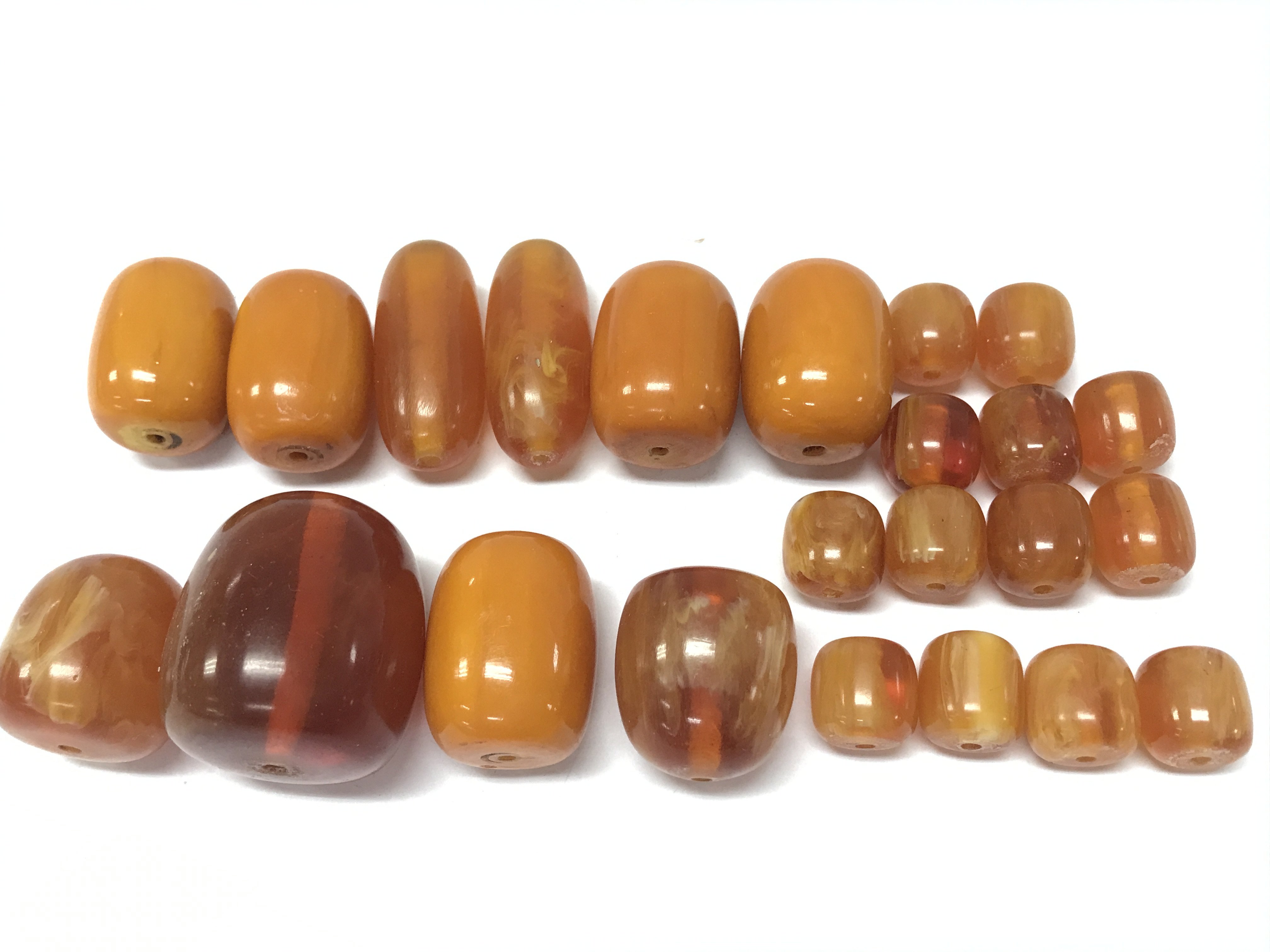 Large bead amber style colour, total weight 155g. Postage cat a