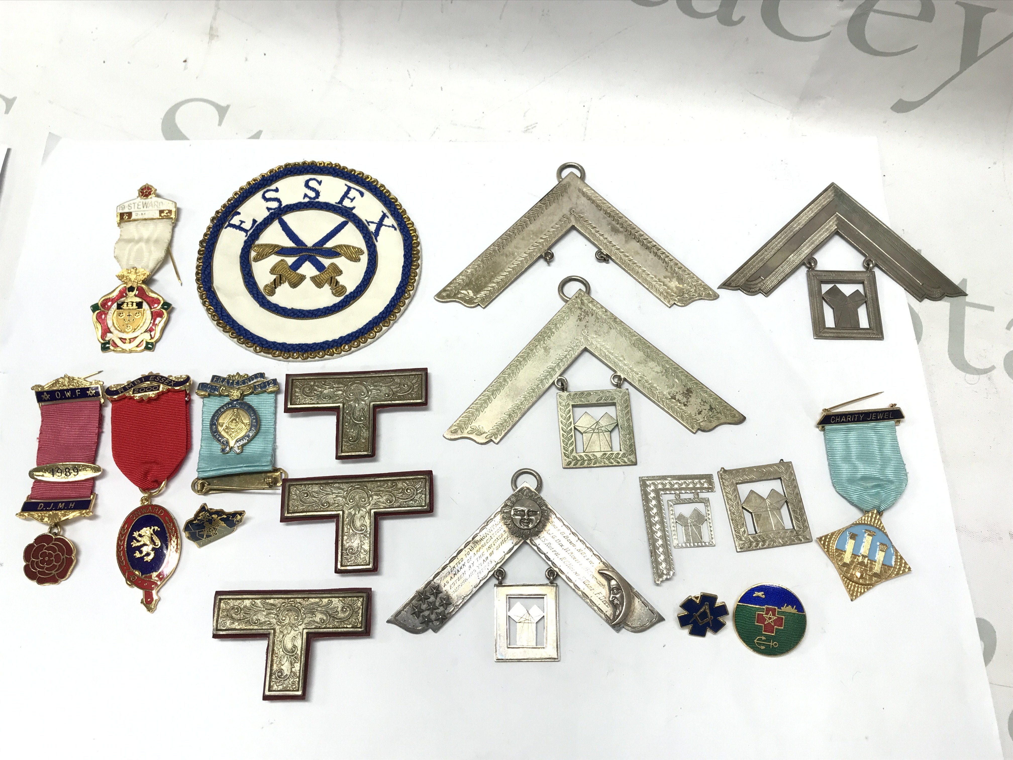 A silver Masonic craft officers collar jewel 1922-23 other craft officers collar jewels gilt metal jewels and an Essex embroidered cloth badge. Postage category B