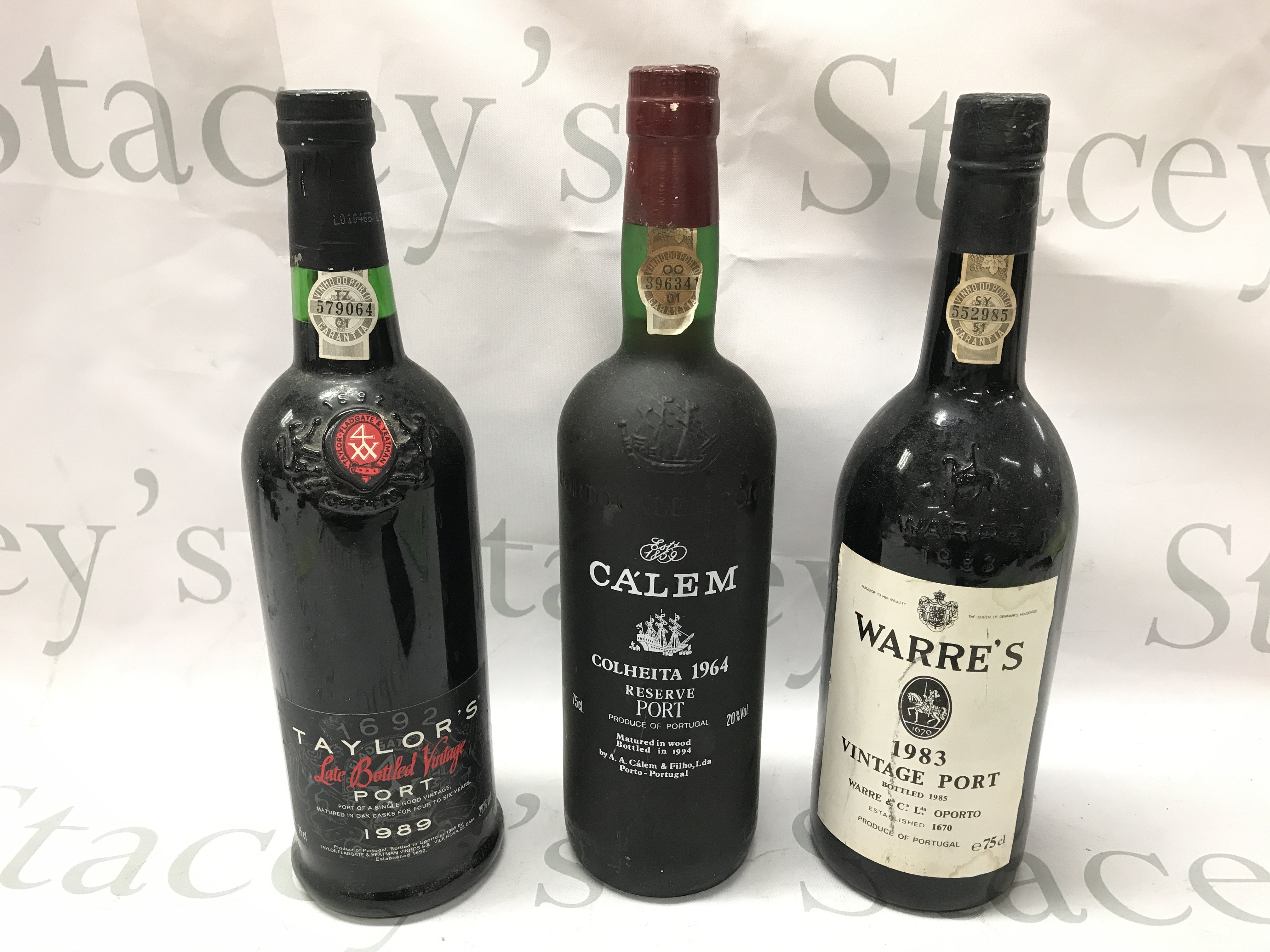 A Taylors 1989, Calem Colheita 1964, Warres 1983 Vintage port. This lot cannot be posted