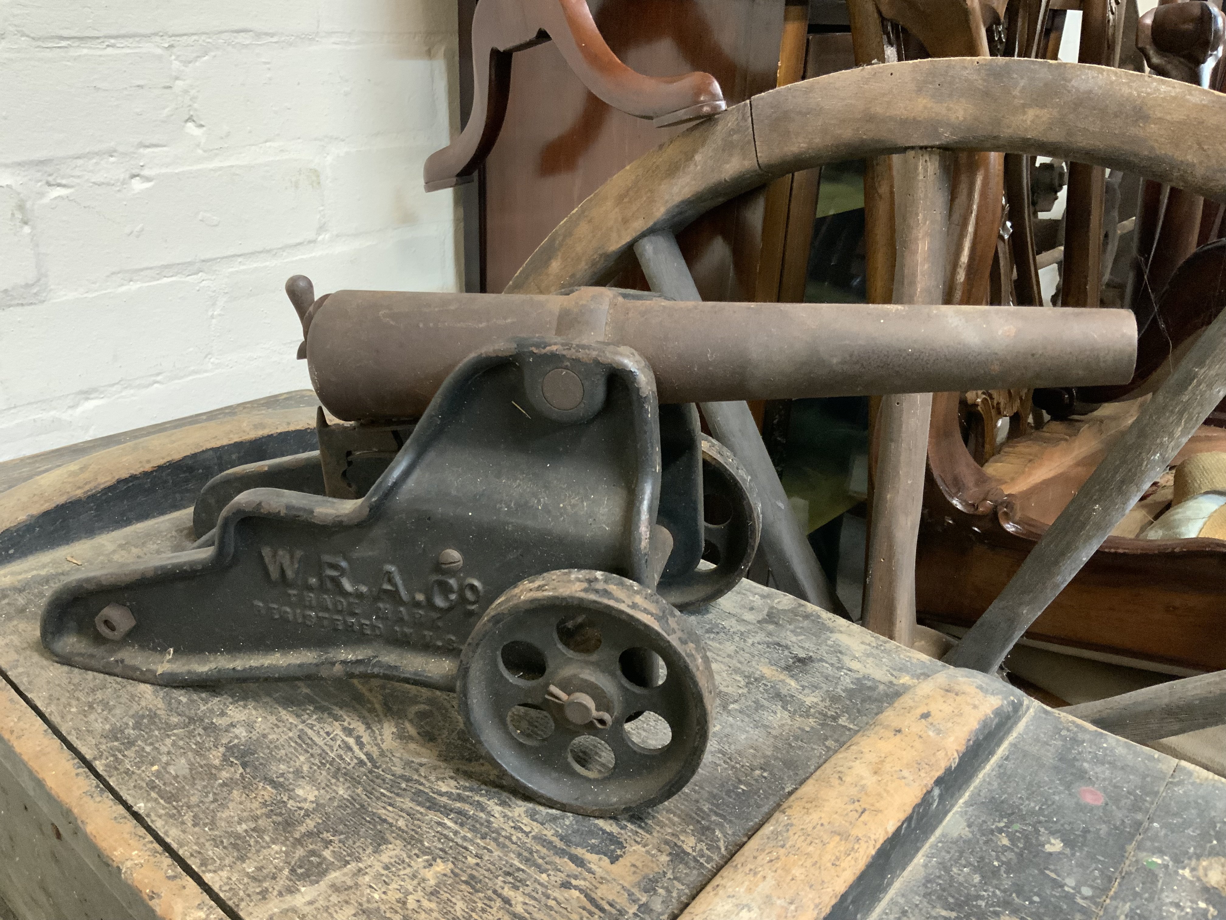 A 10-BORE STARTING GUN BY THE WINCHESTER REPEATING ARMS CO., U.S.A., CIRCA 1901 with tapering rolled steel barrel inscribed to top with maker's name and dated '1901', mounted on heavy cast iron carriage inscribed 'W.R.A.Co.' -- 7&frac12; x 17in. (19 x 43cm.)