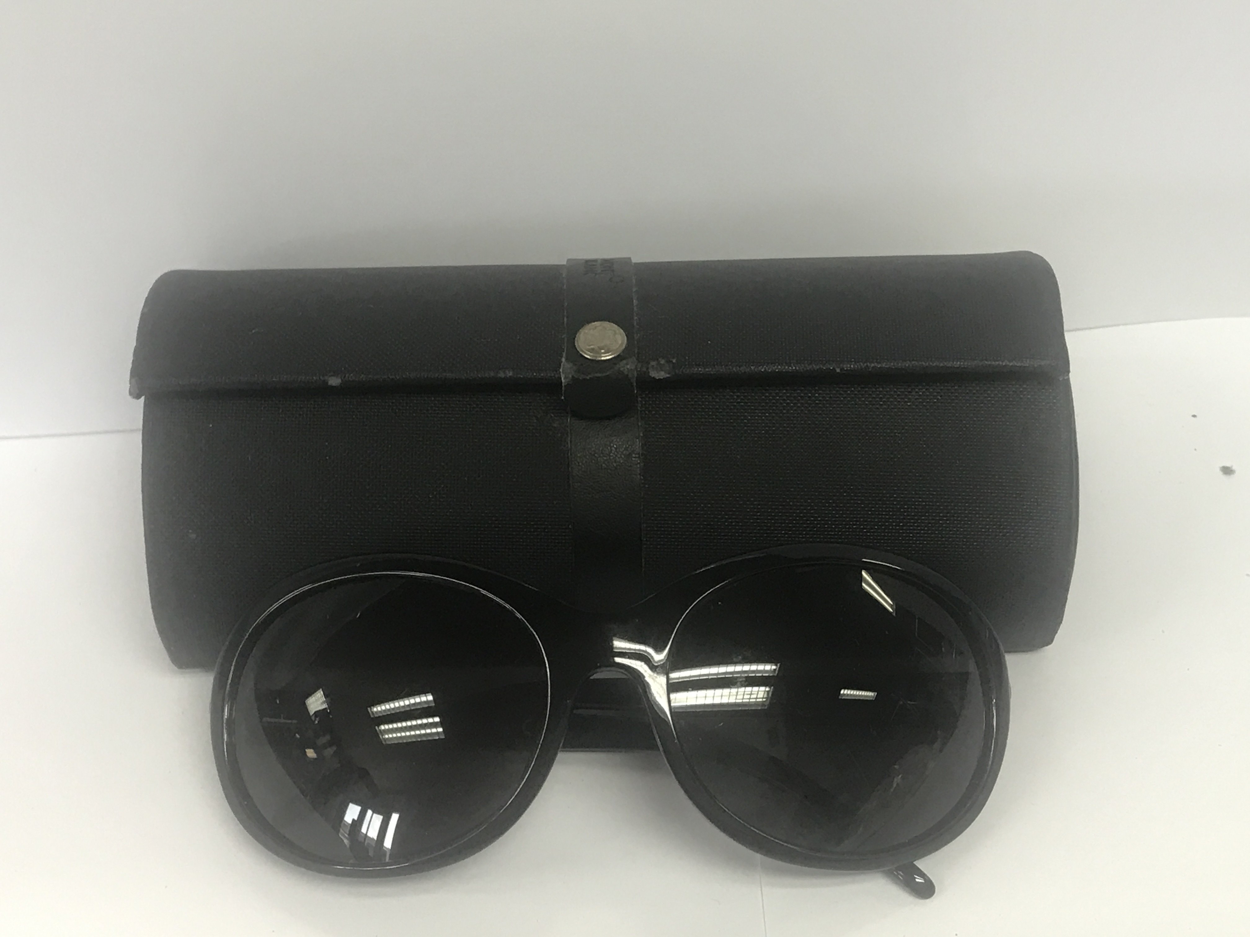 A pair of ladies Mont Blanc sun glasses in a case