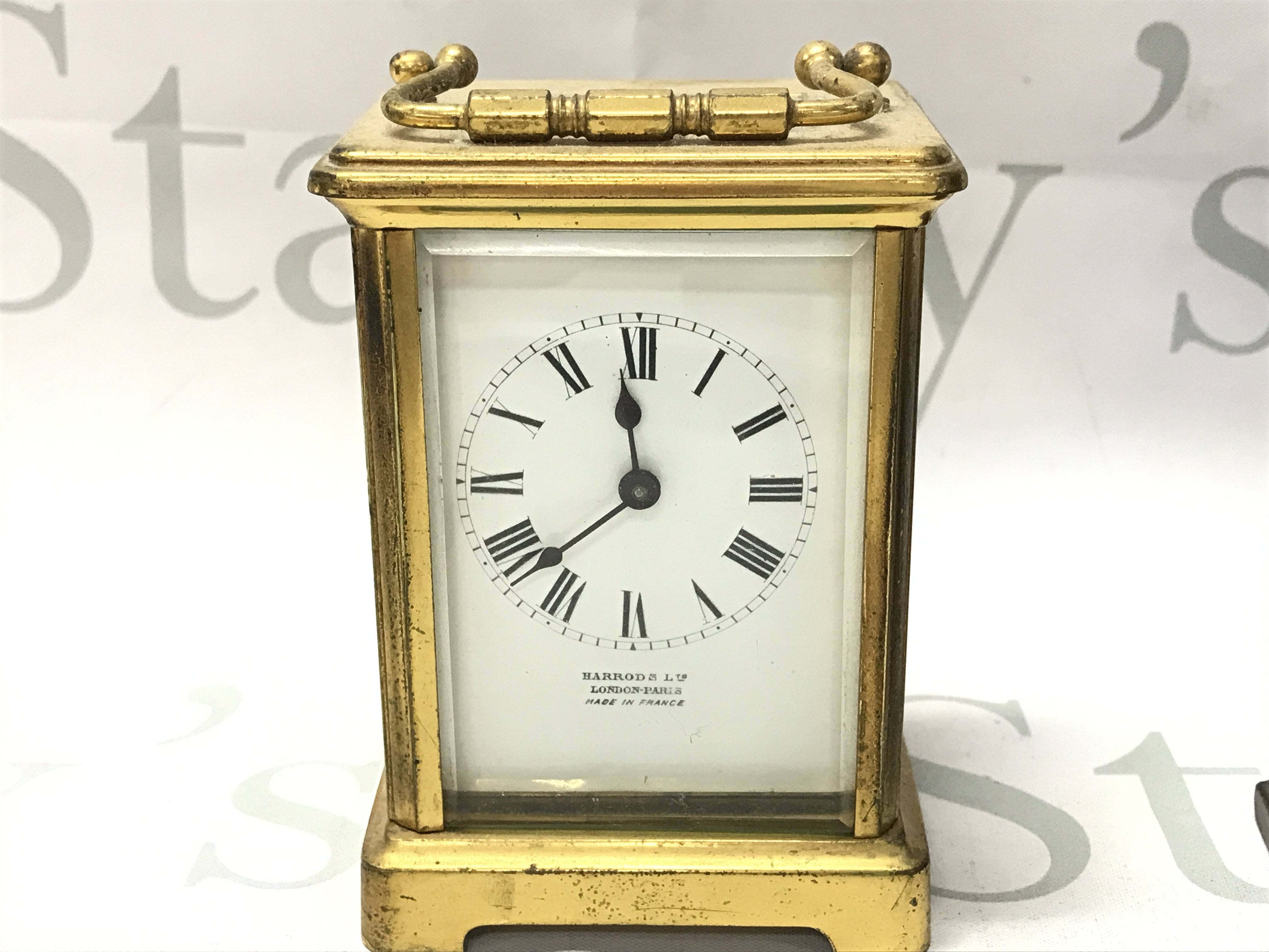 A Harrod & Ltd carriage clock. This lot cannot be posted