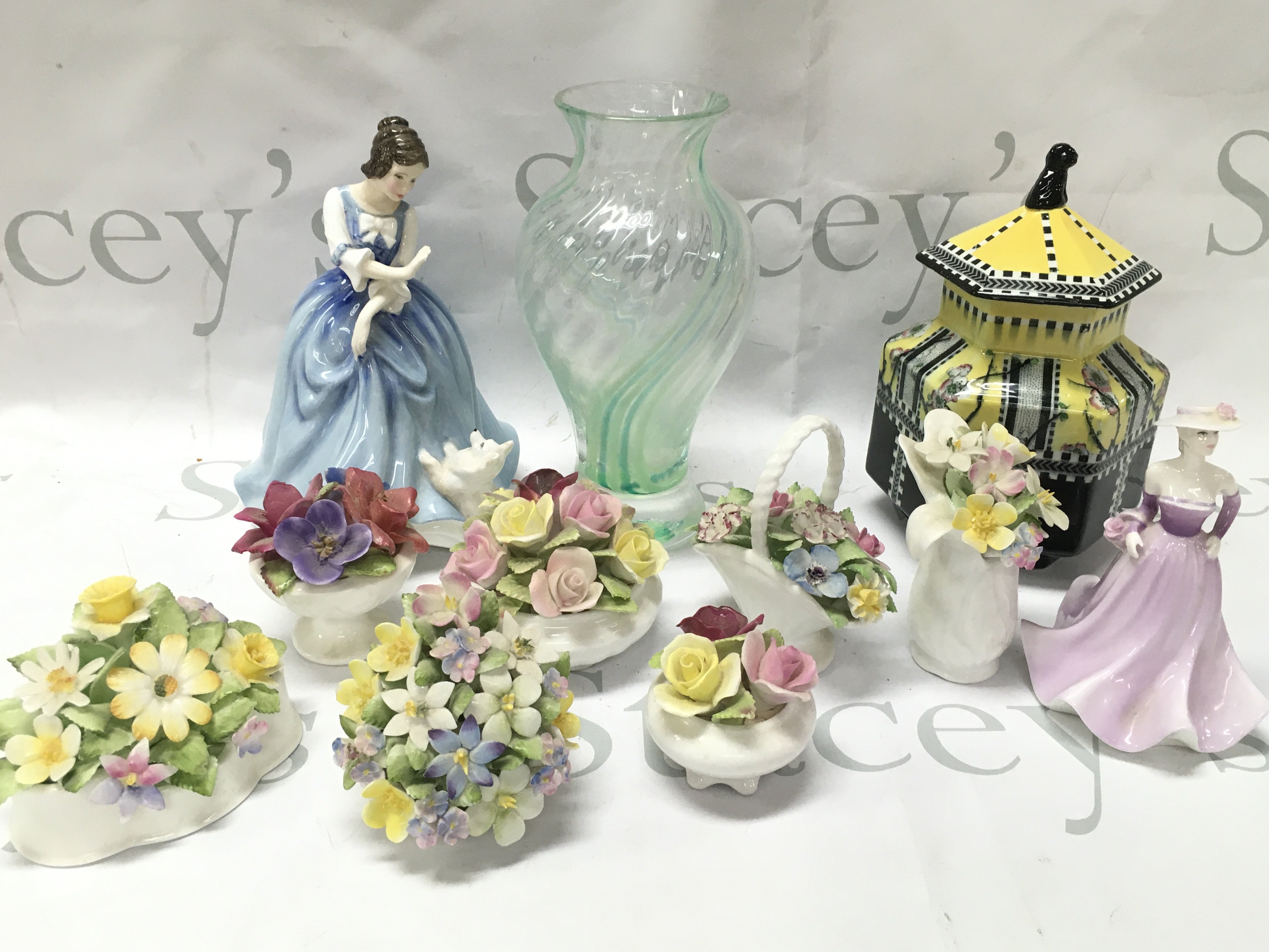 A collection of posy baskets including Coalport, Royal Doulton, Doulton figure Lorraine, Coalport Loretta, Staffordshire spring vase. This lot cannot be posted
