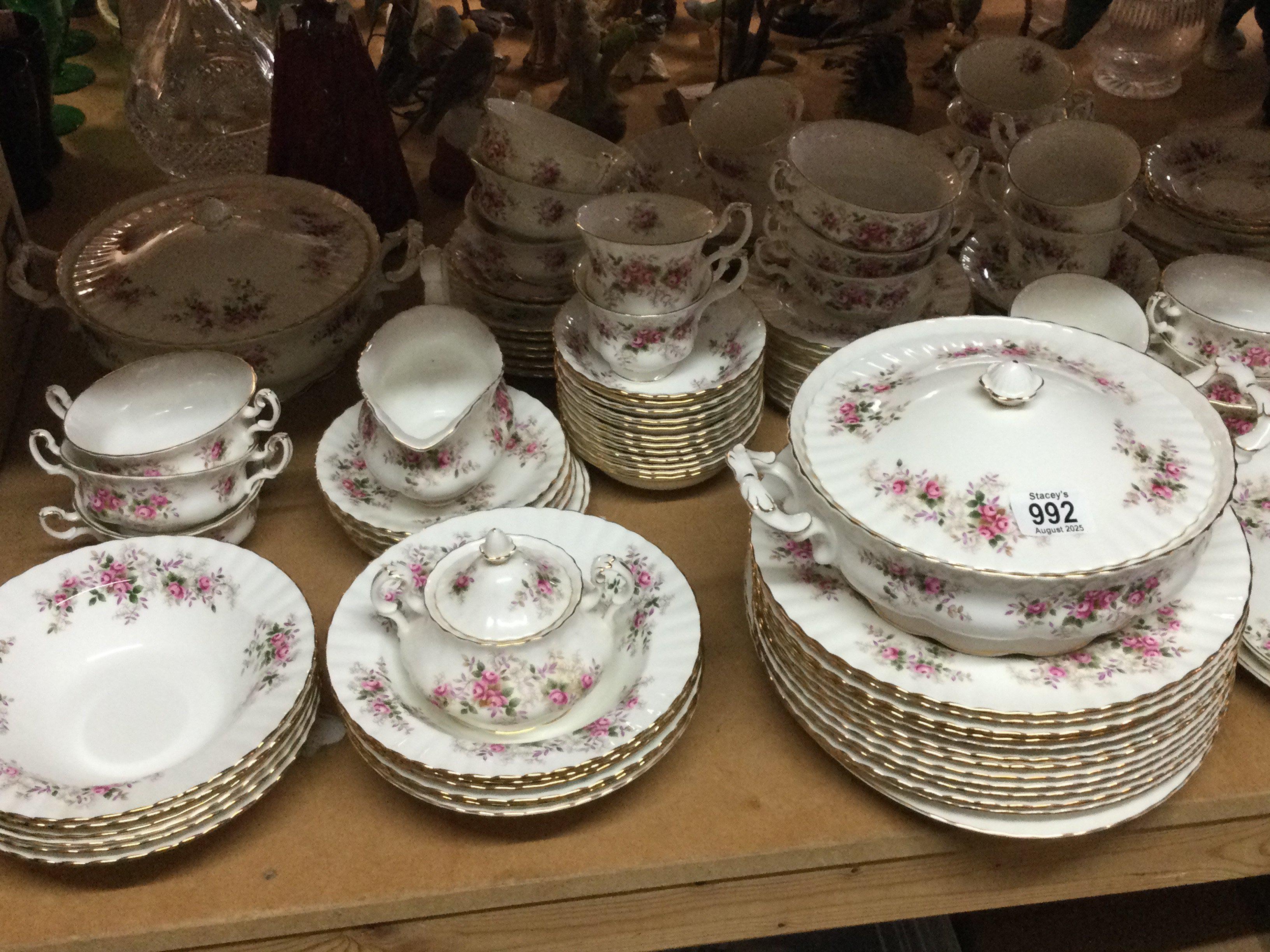 A Royal Albert Lavender Rose tea dinner service comprising tureens dinner plates cups saucers And side plates.