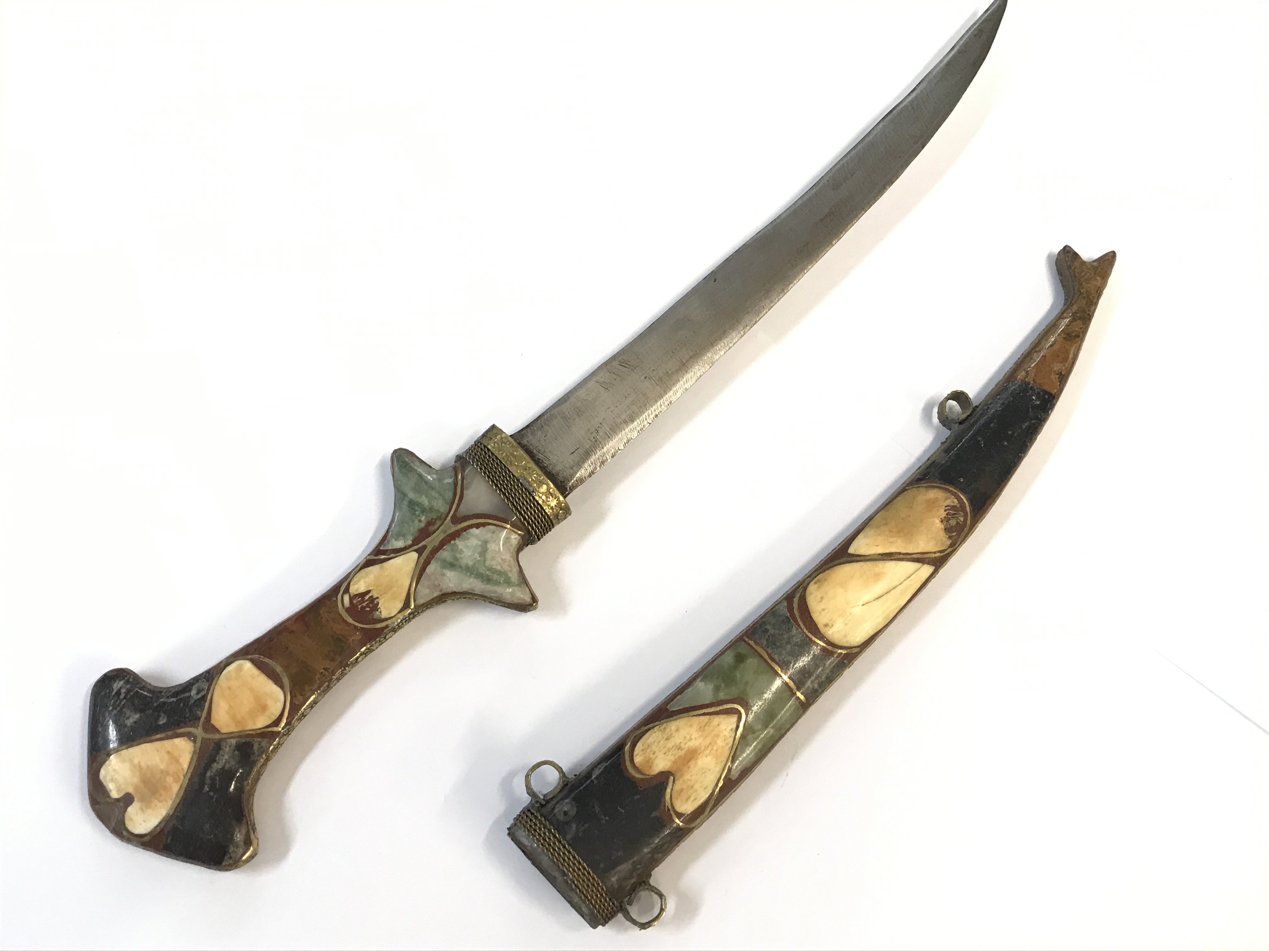 A Vintage Traditional Hand made Moroccan Berber dagger set with polished stone. 43cm approximately.