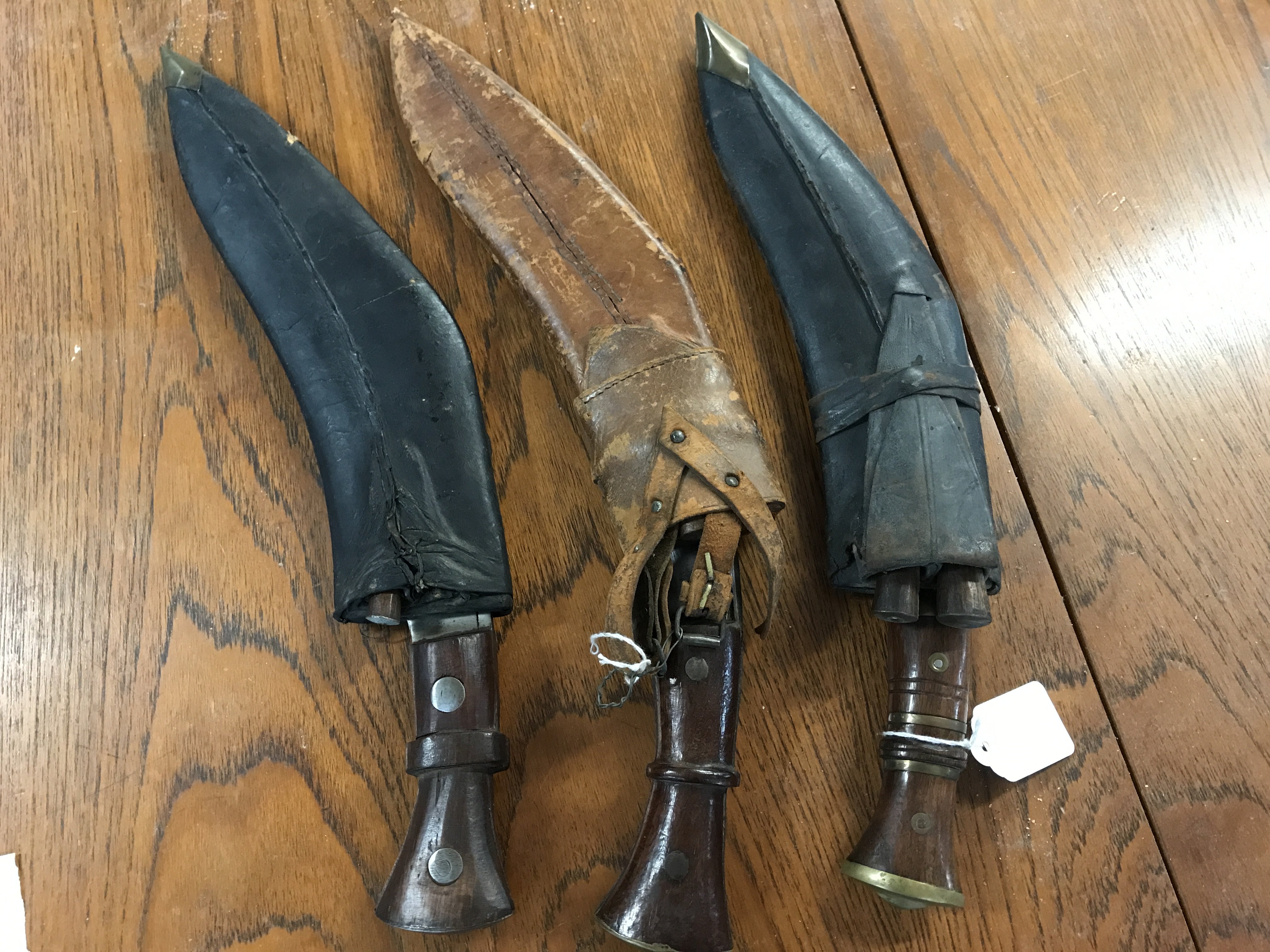 Early 20th Century Kukri Knives ,The Traditional Nepalese knife, With brass set wood handles