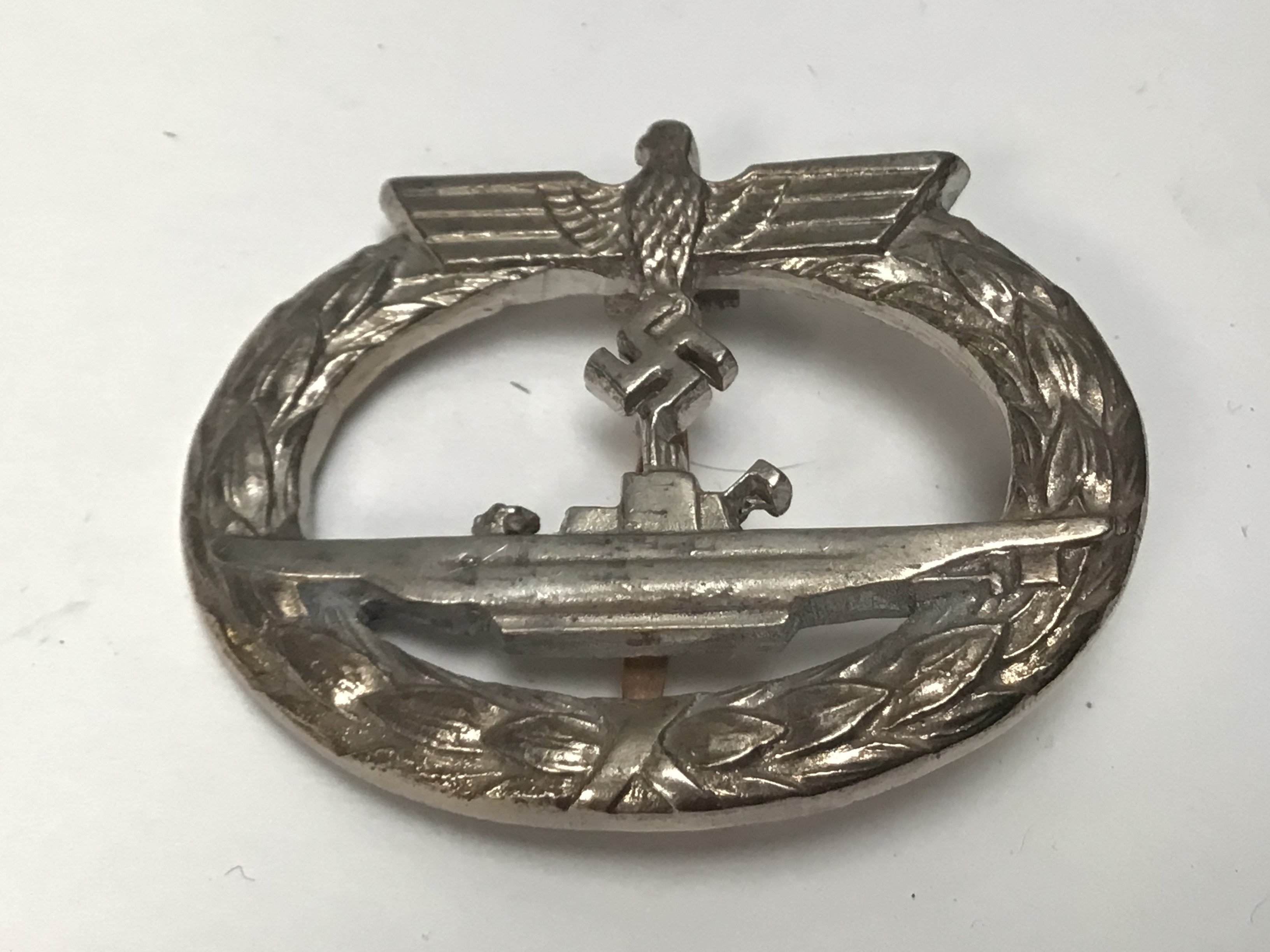 A German Third Reich U boat badge the reverse with makers mark schwwerin. Possible retrospective copy.
