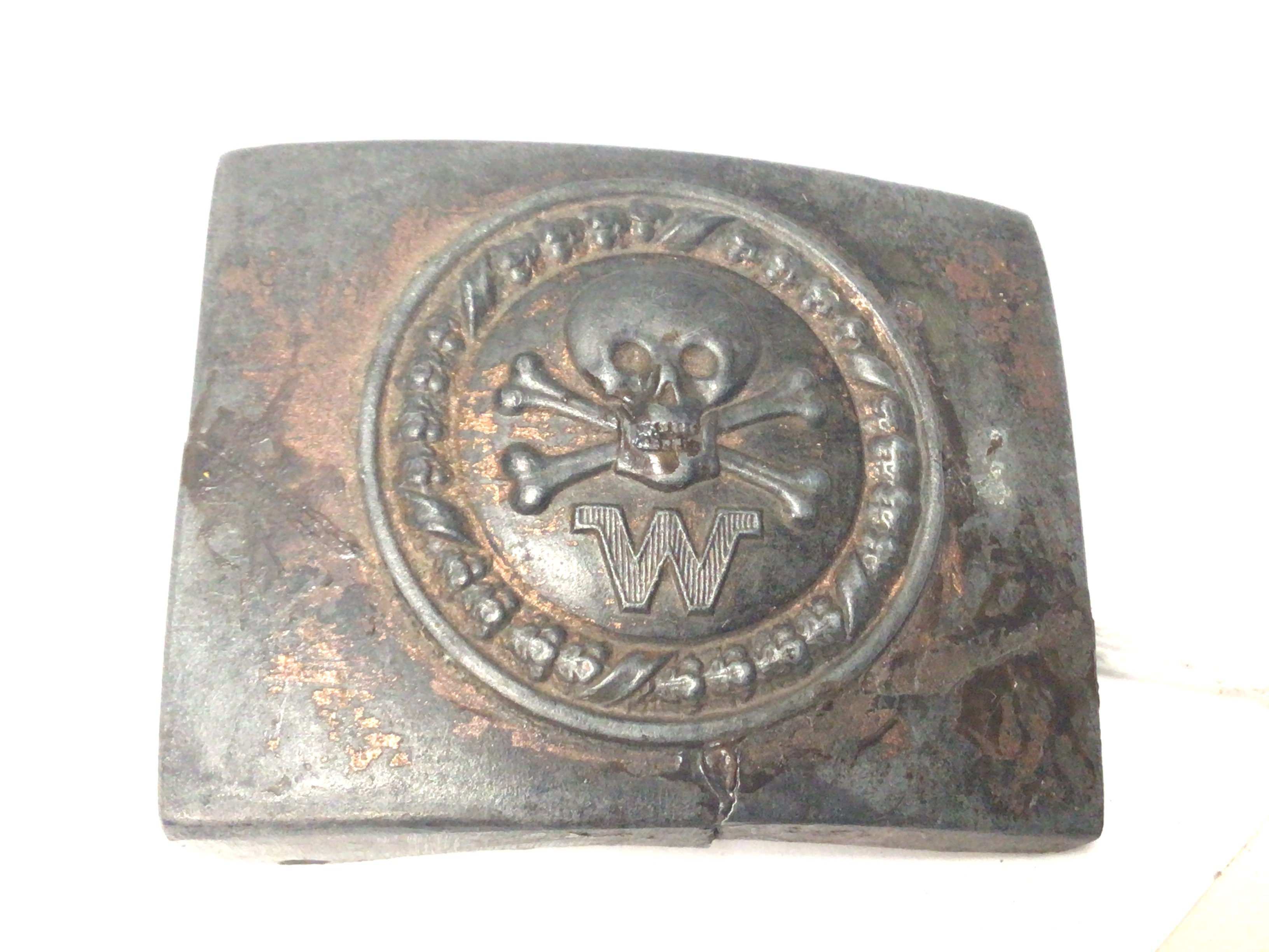 An Extremely rare. German Third Reich Elite SS Werwolf Division. A Special German Unit sent behind allied and British lines 1944. The Werwolf division had only approximately 5000 troops.The buckle with makers marks and other marks.