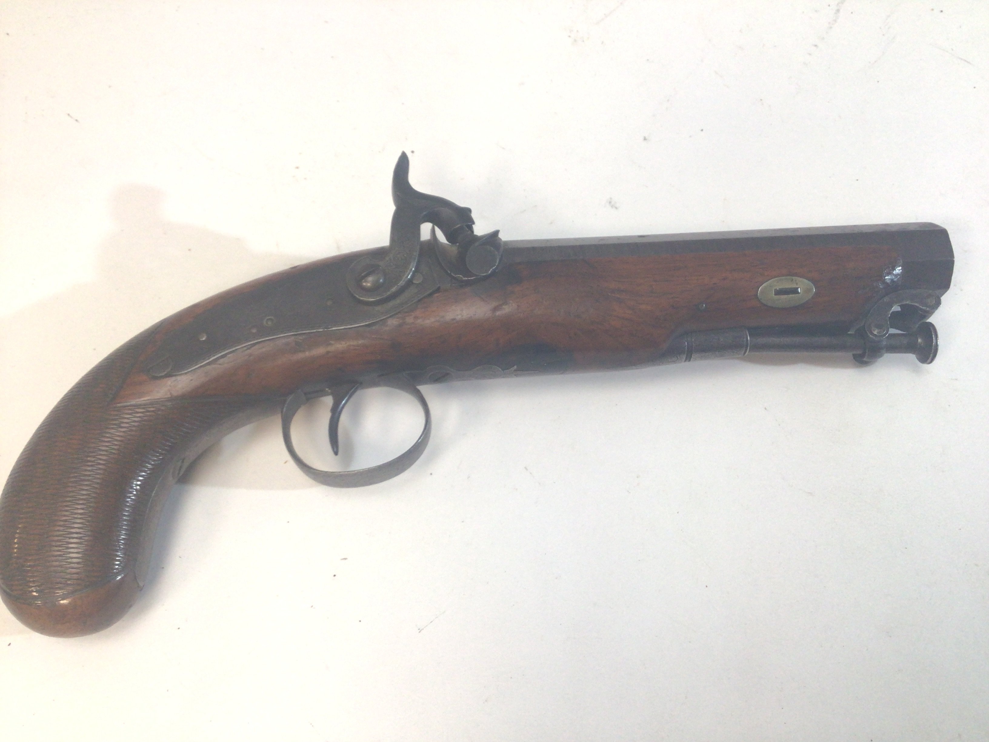 A British 19th century Percussion Pistol maker Perrins of Worcester with an Octagonal barrel. Fixed steel ram rod.