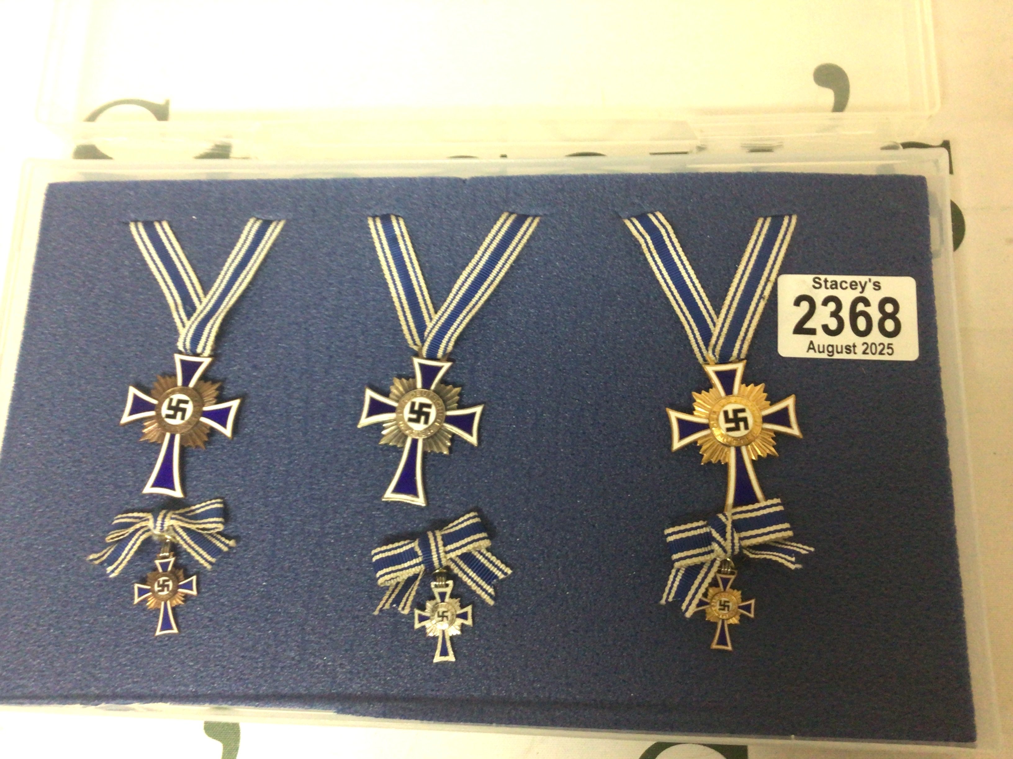 A set of Three German Third Reich Mother Honour crosses Bronze silver and gold with miniatures.