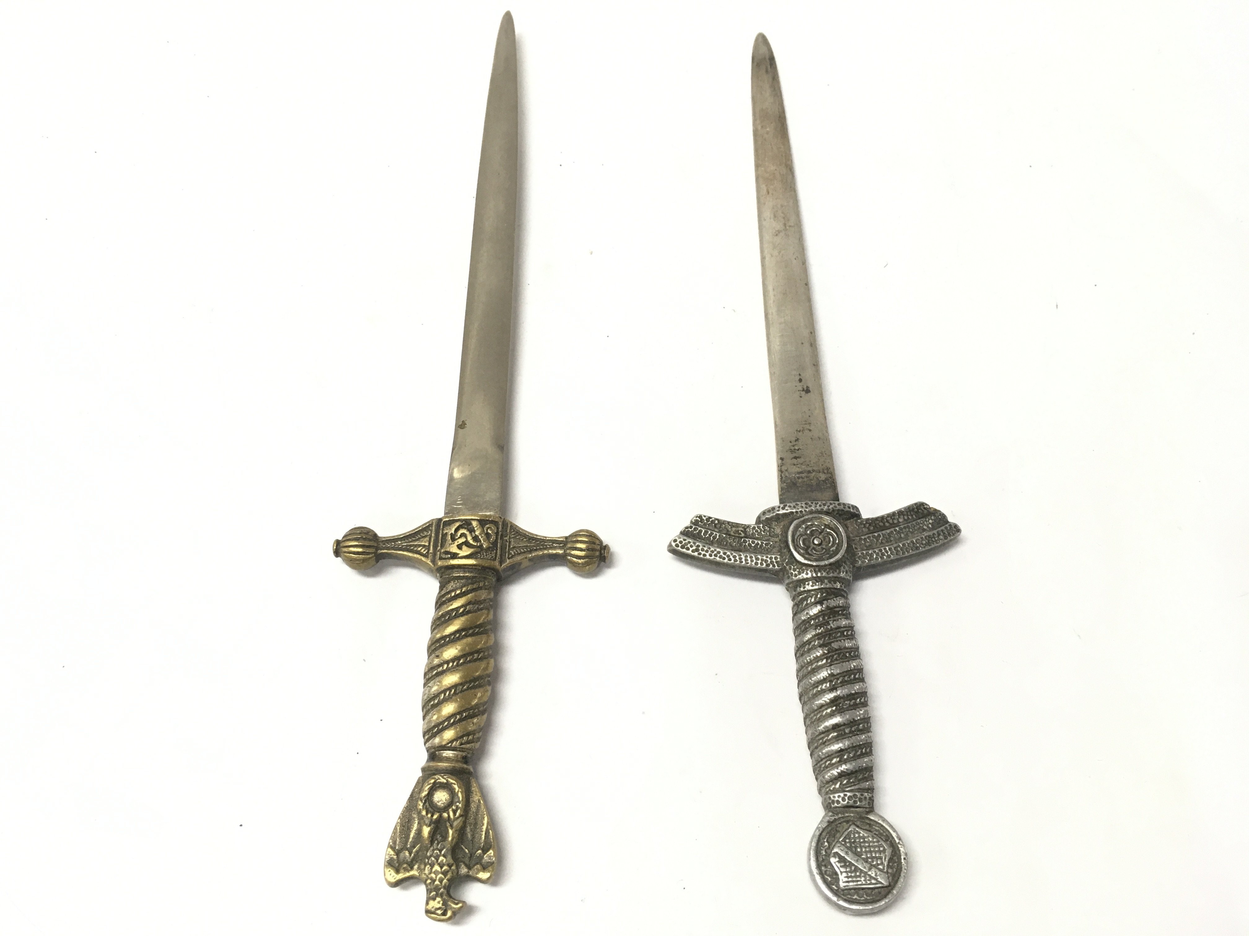 Kriegsmarine and Luftwaffe presentation paper knifes. 21cm long approximately. Postage category B