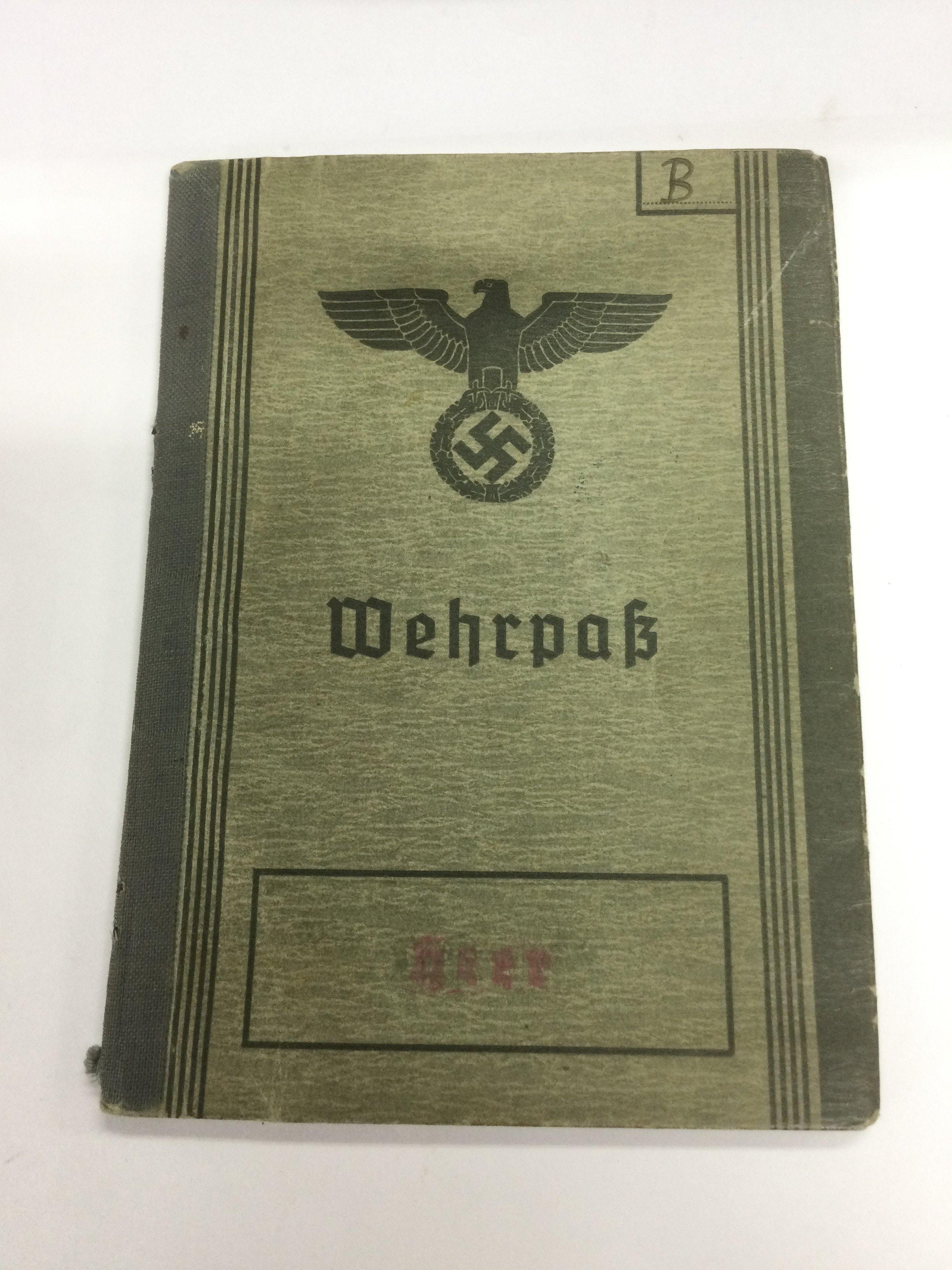 A Third Reich service book. Shipping category A.