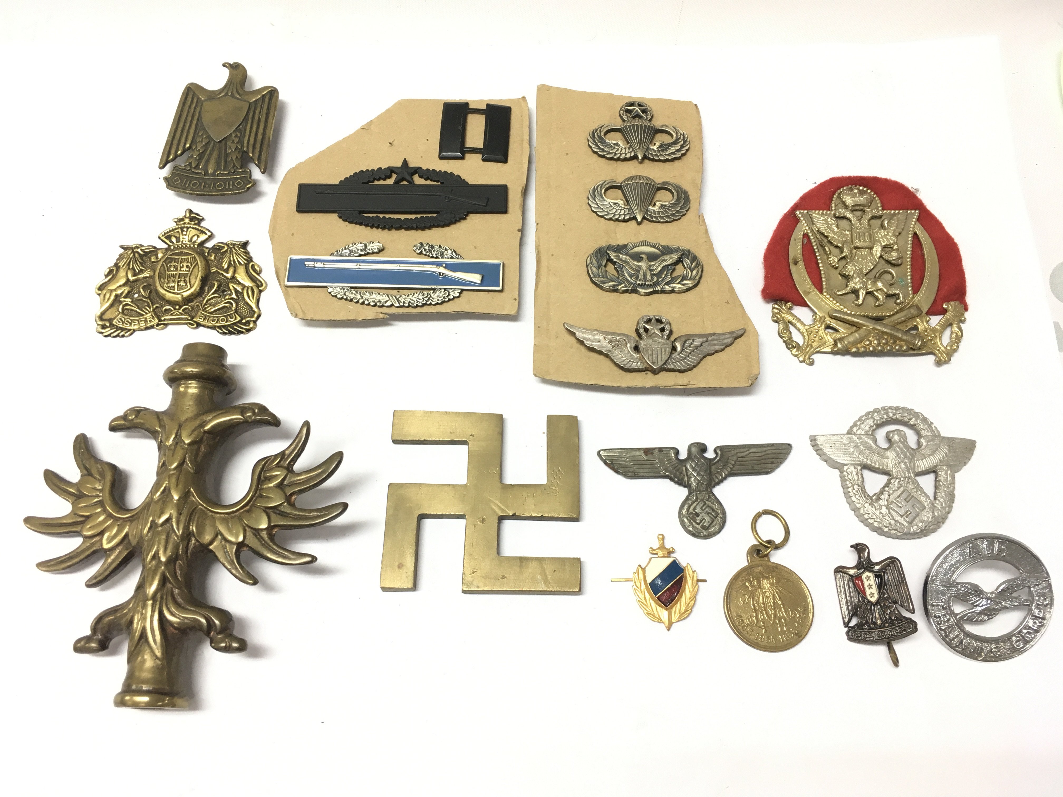 A collection of mixed WW2 badges included some Third Reich, postage category B
