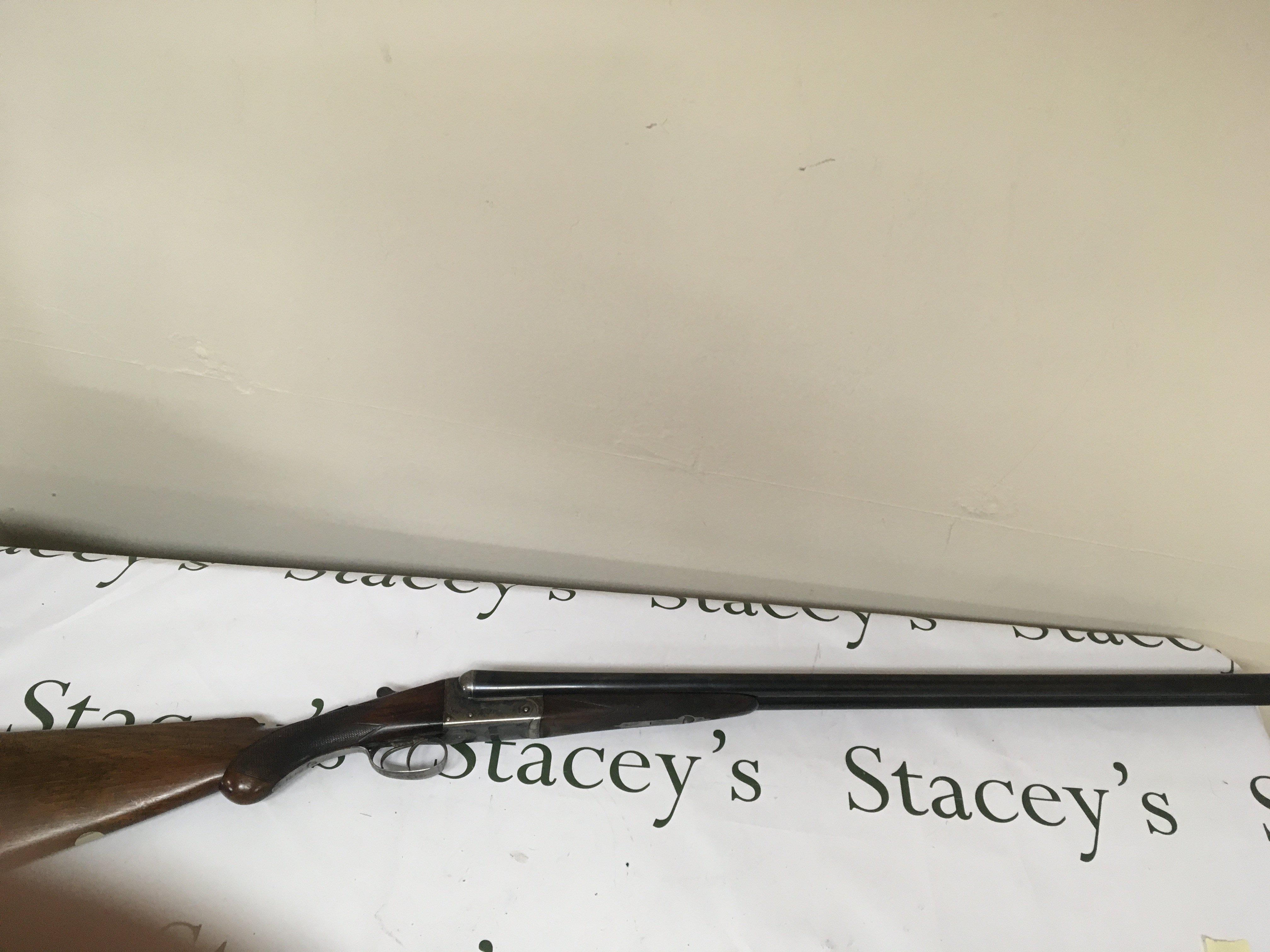 An English 12bore double barrel sporting shot gun side by side barrels fixed choke double trigger ejector. Maker T Baker of London serial number 8471 PLEASE NOTE A SHOTGUN LICENCE IS REQUIRED TO BUY THIS LOT VIEWING AND COLLECTION IS BY APPOINTMENT ONLY.