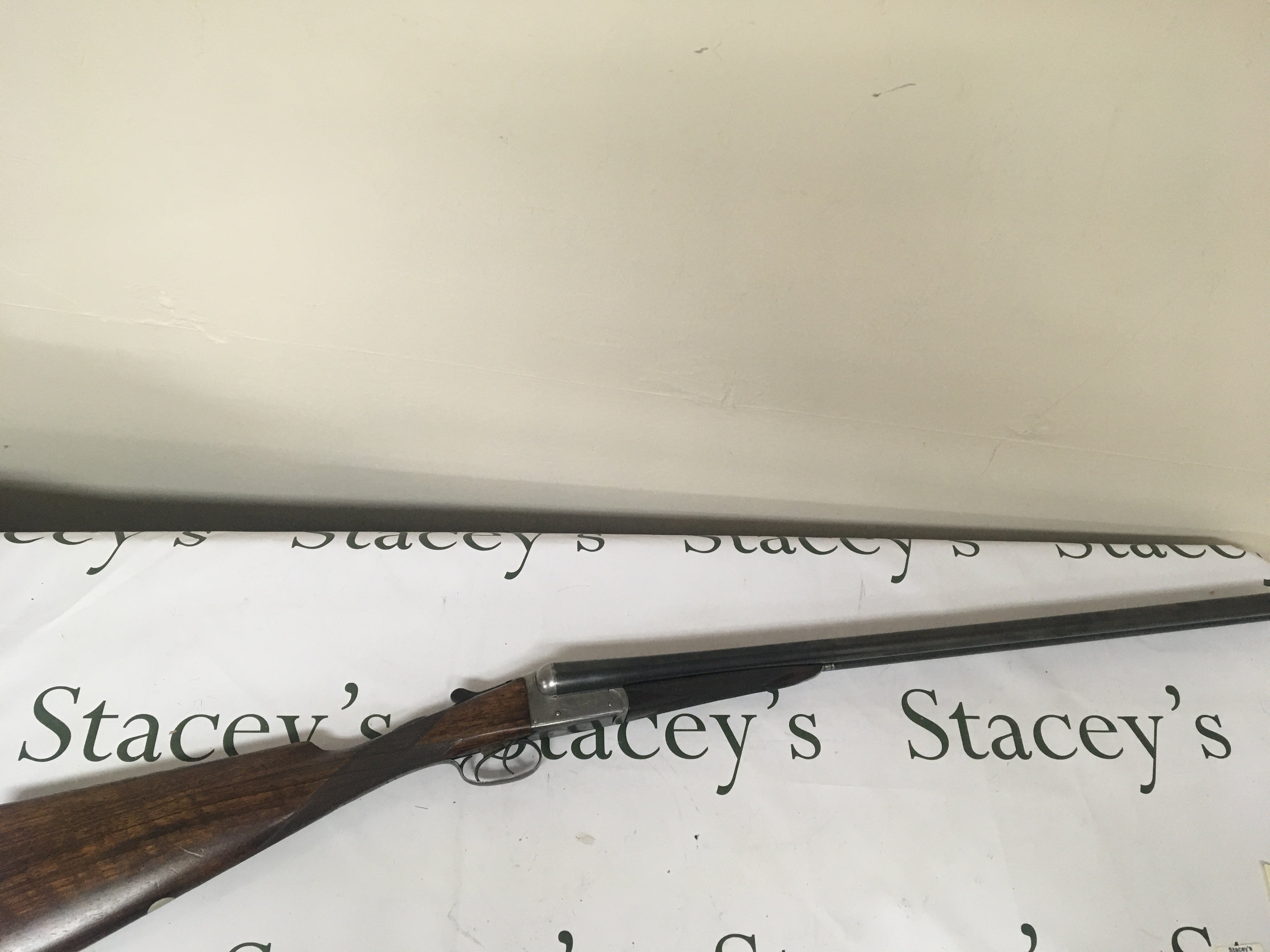A Sporting Shotgun 12bore side by side maker Woodward & Son London ejector fixed choke double trigger serial number 63775. 27 inch barrel PLEASE NOTE A SHOTGUN LICENCE IS REQUIRED TO BUY THIS LOT VIEWING AND COLLECTION IS BY APPOINTMENT ONLY.