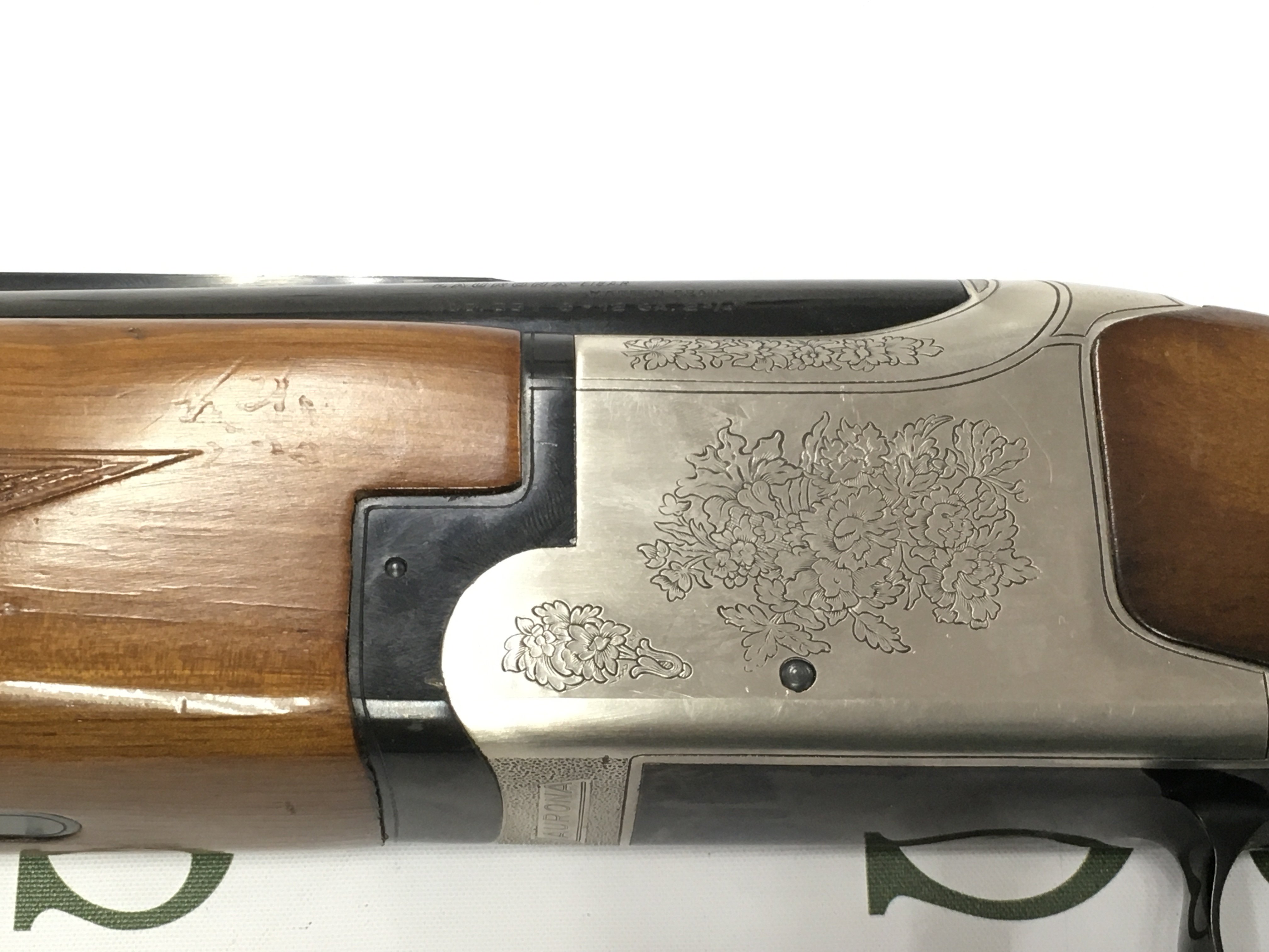 A Laurona 12g over under shotgun with ejectors and fixed chokes. 28inch barrels and 44 inches overall. Serial number 224300. PLEASE NOTE THAT A SHOTGUN LICENSE IS REQUIRED TO PURCHASE THIS ITEM. COLLECTION AND VIEWING BY APPOINTMENT ONLY.