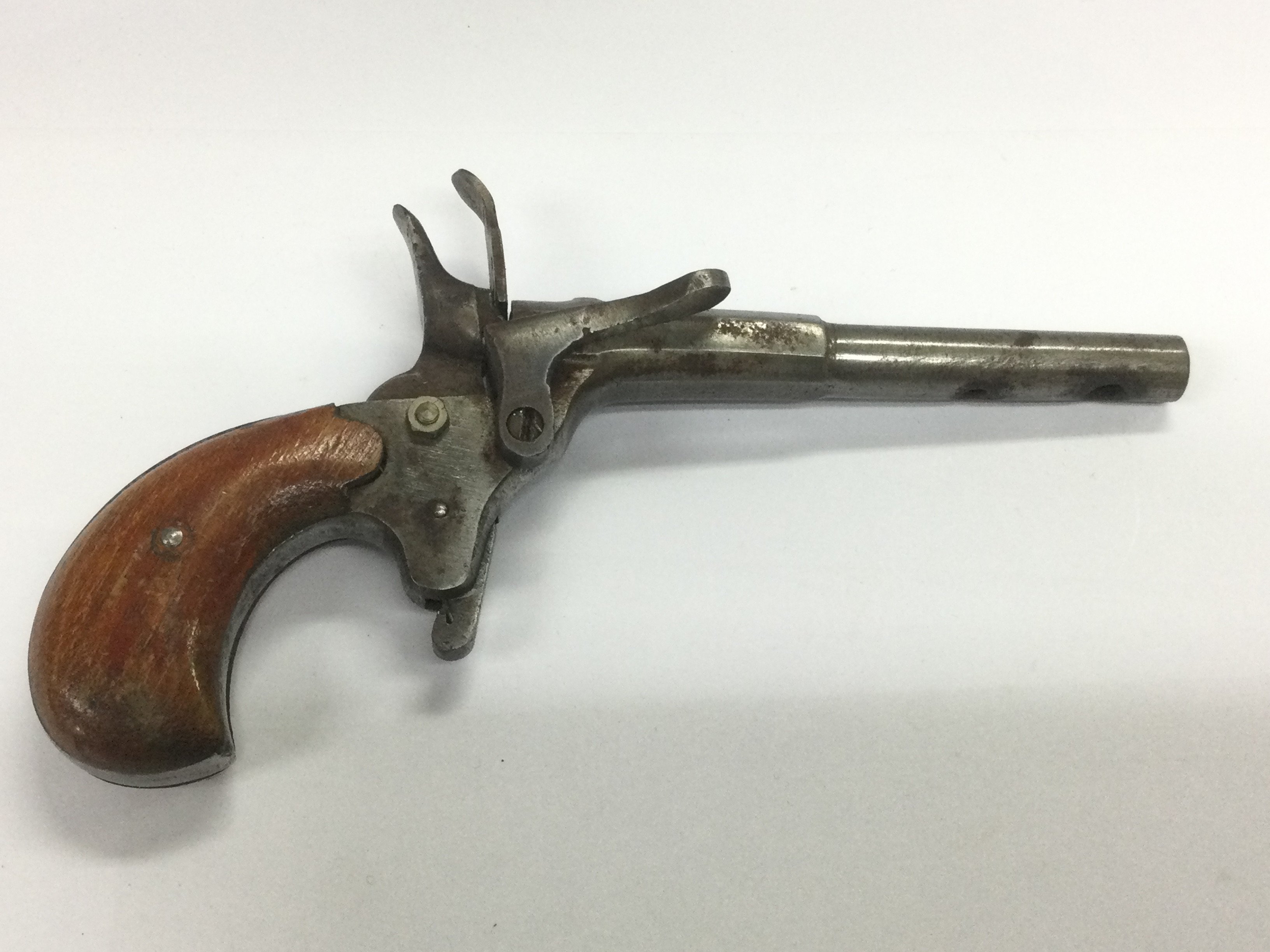 A small Belgian rim fire pistol. Shipping category D.