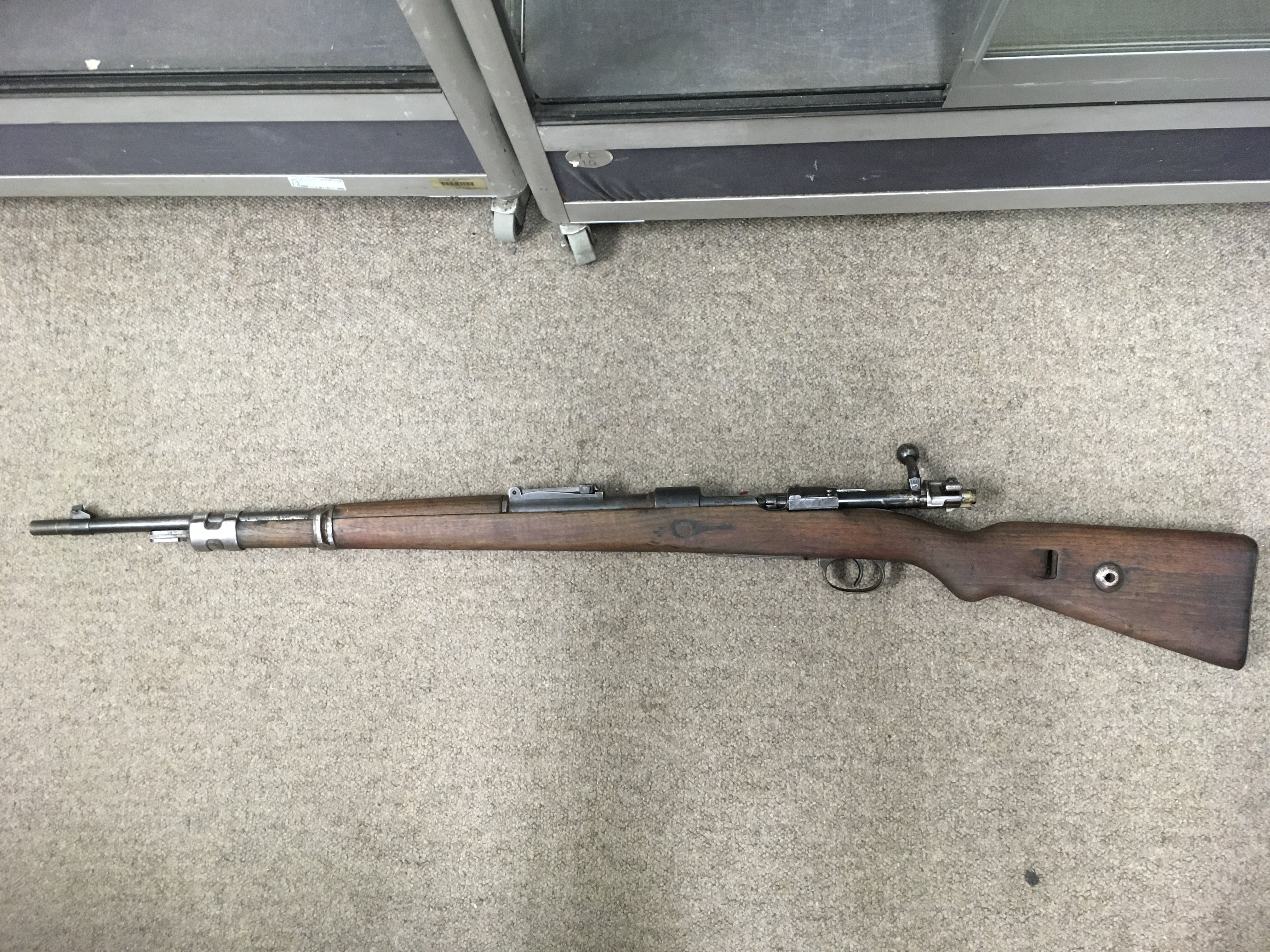 SECTION 1 FIREARMS LICENCE REQUIRED. A 1937 Mauser bolt action 5/42 rifle, the barrel with further proof marks. Please note that buyers must satisfy themselves as to the authenticity before bidding and be in possession of a valid firearms licence. Shipping category D.