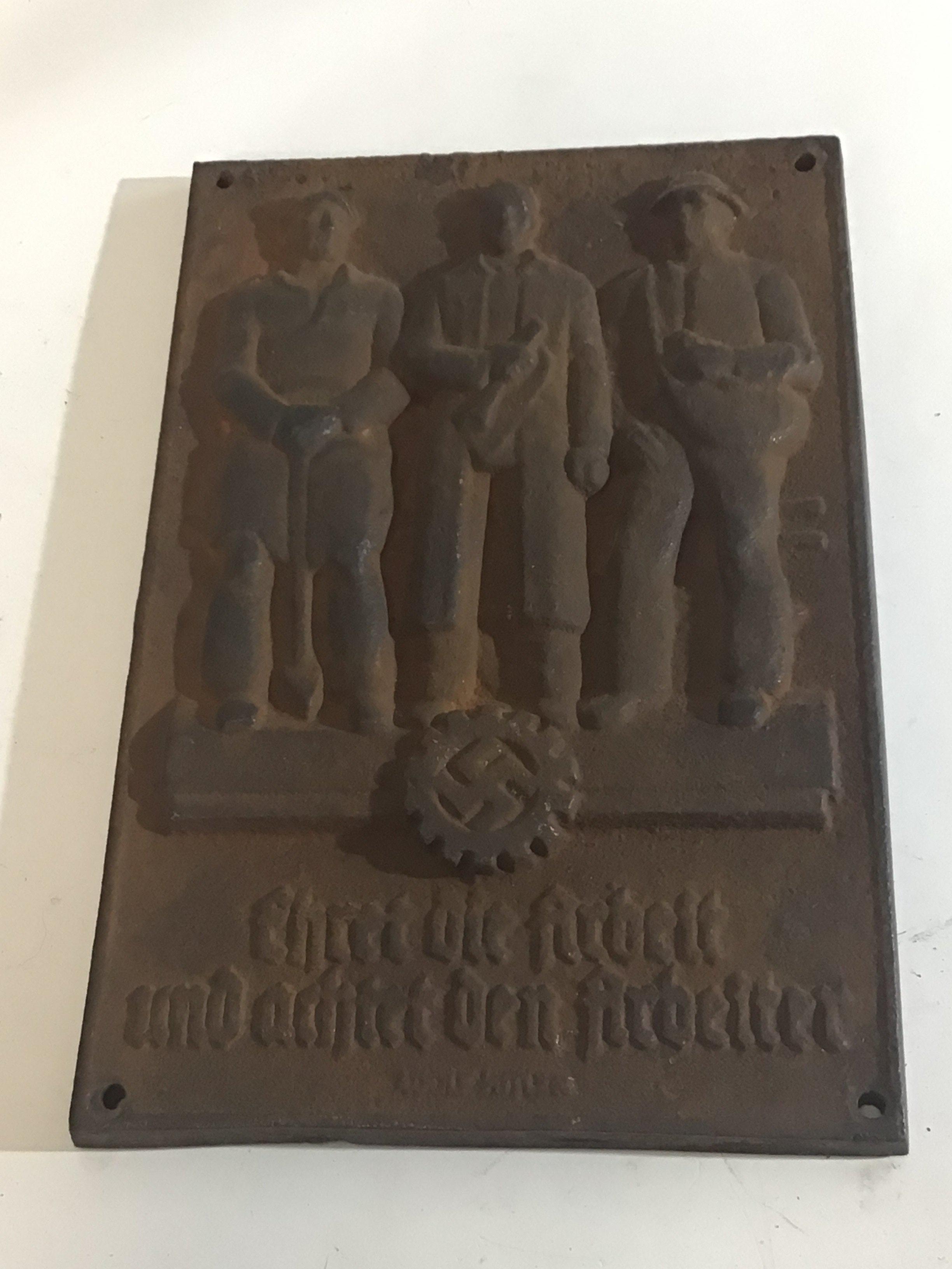 A Cast Iron plaque German Third workers party with inscription.