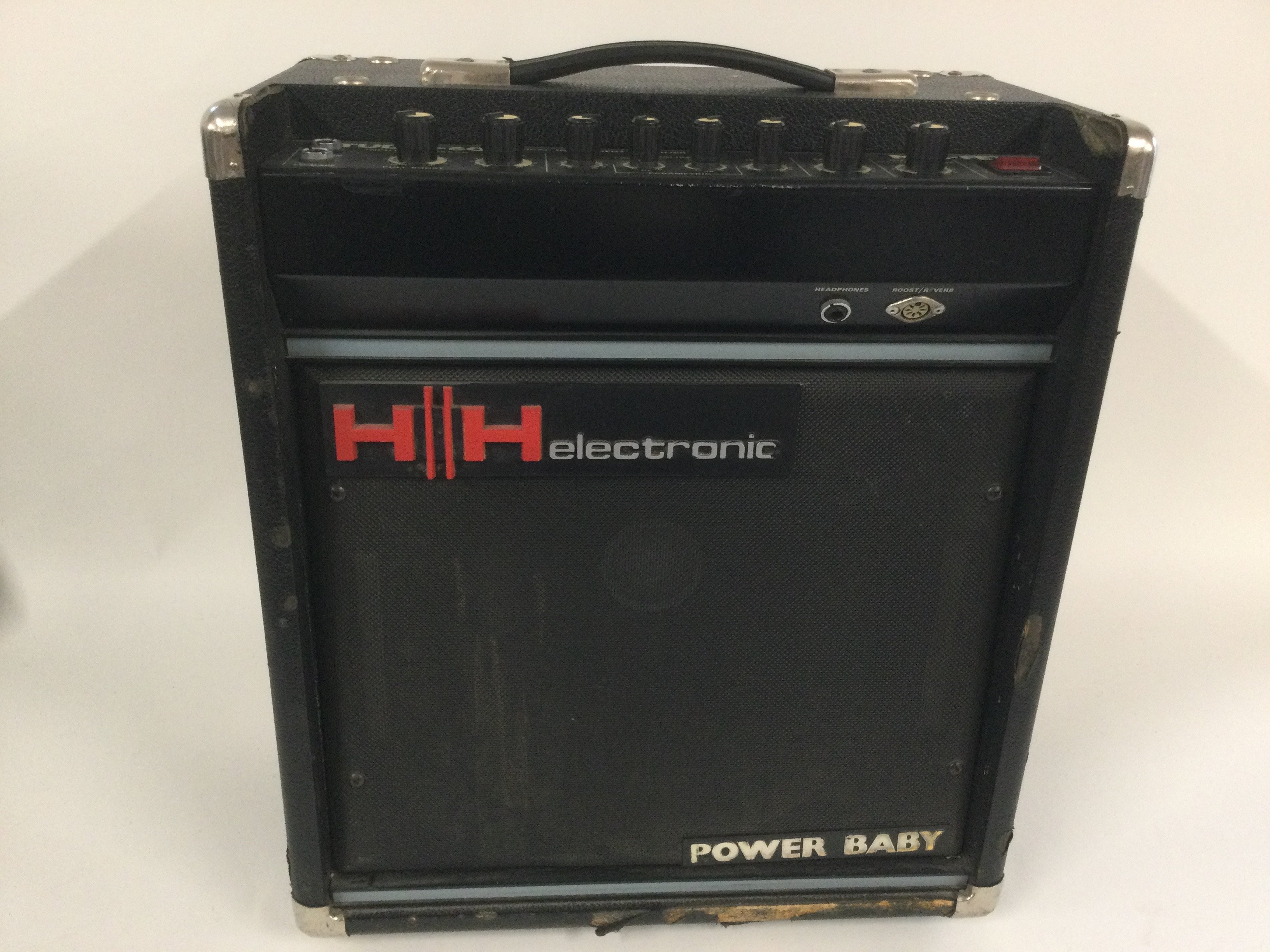 An HH Studio 60W guitar combo amplifier and cover.