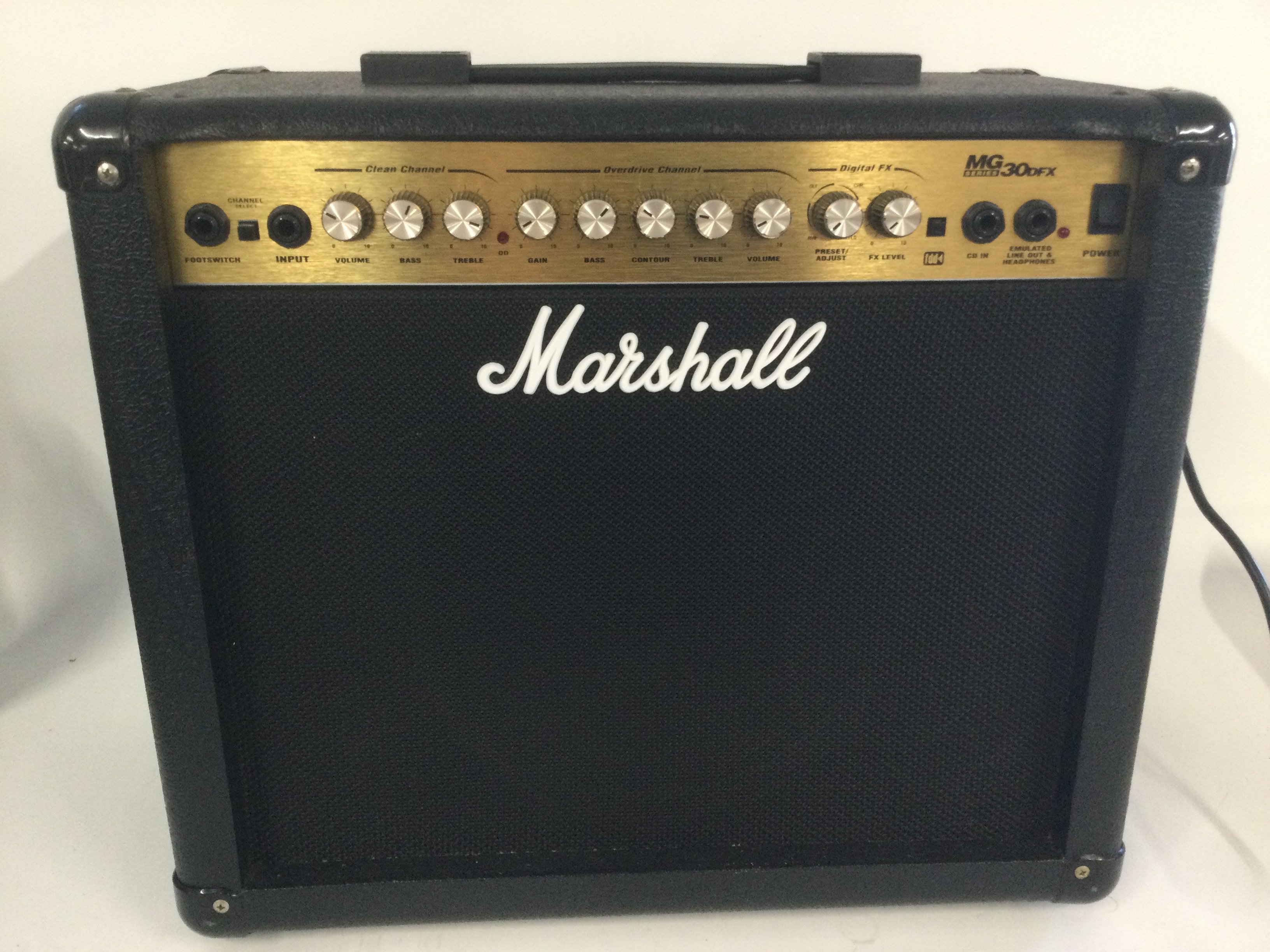 A Marshall MG 30DFX guitar amplifier.