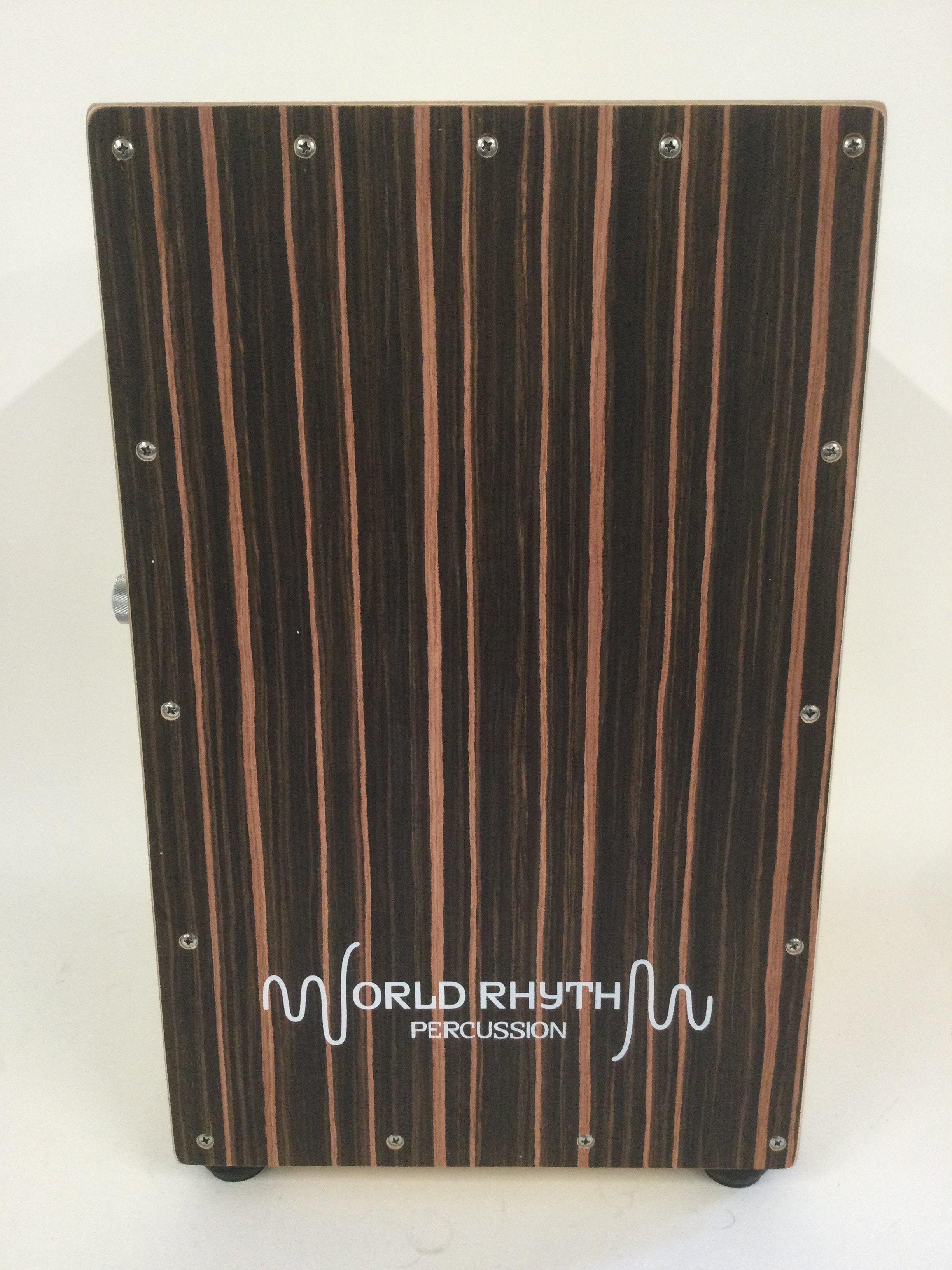 A World Rhythm Percussion cajon drum with original cover.