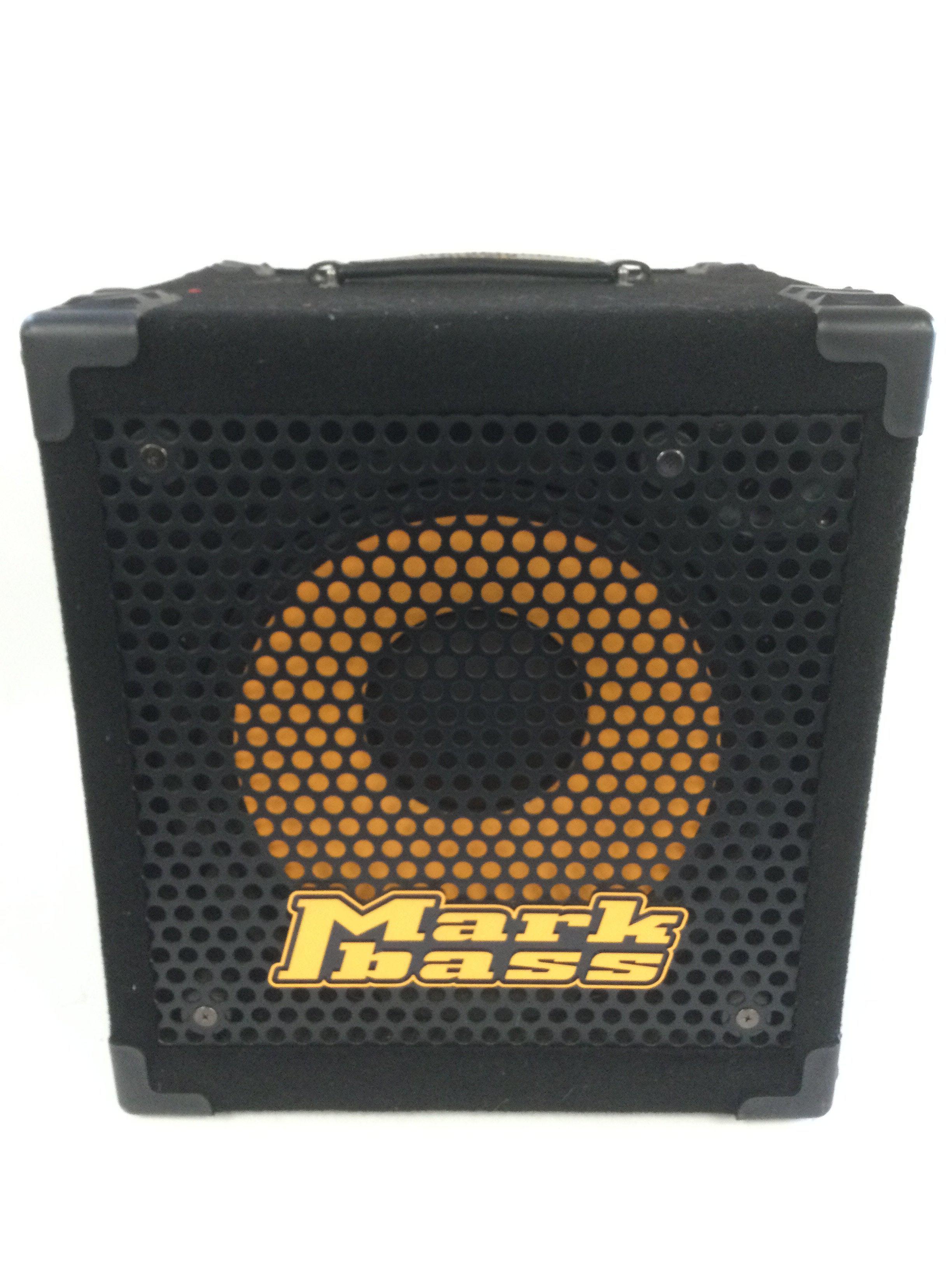A Mark Bass combo head II with original cover.