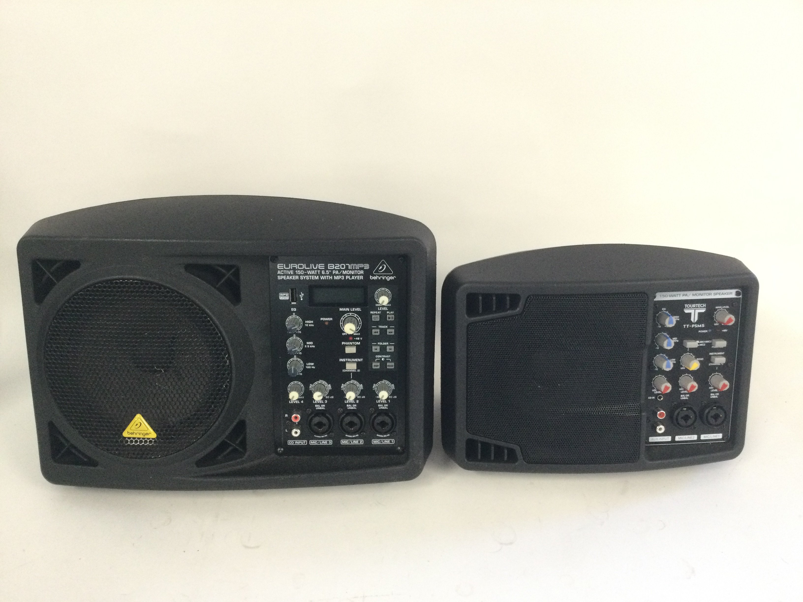 A Eurolive B207 150W PA/monitor speaker system, a Tourtech PA/monitor speaker and a bag of leads (3).