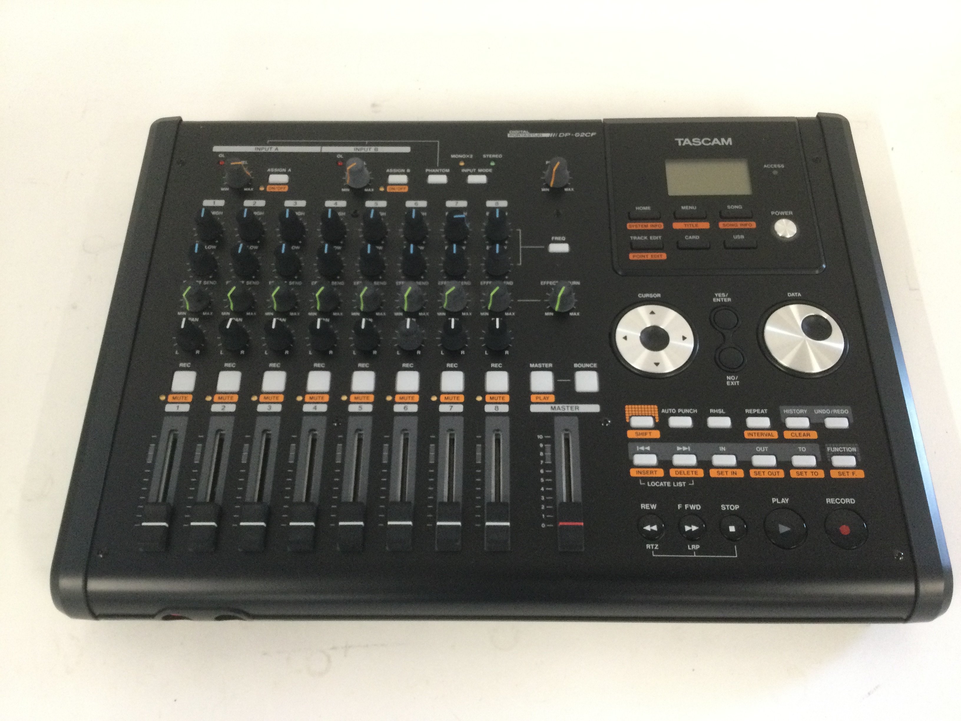 A boxed Tascam DP-02CF digital portastudio.