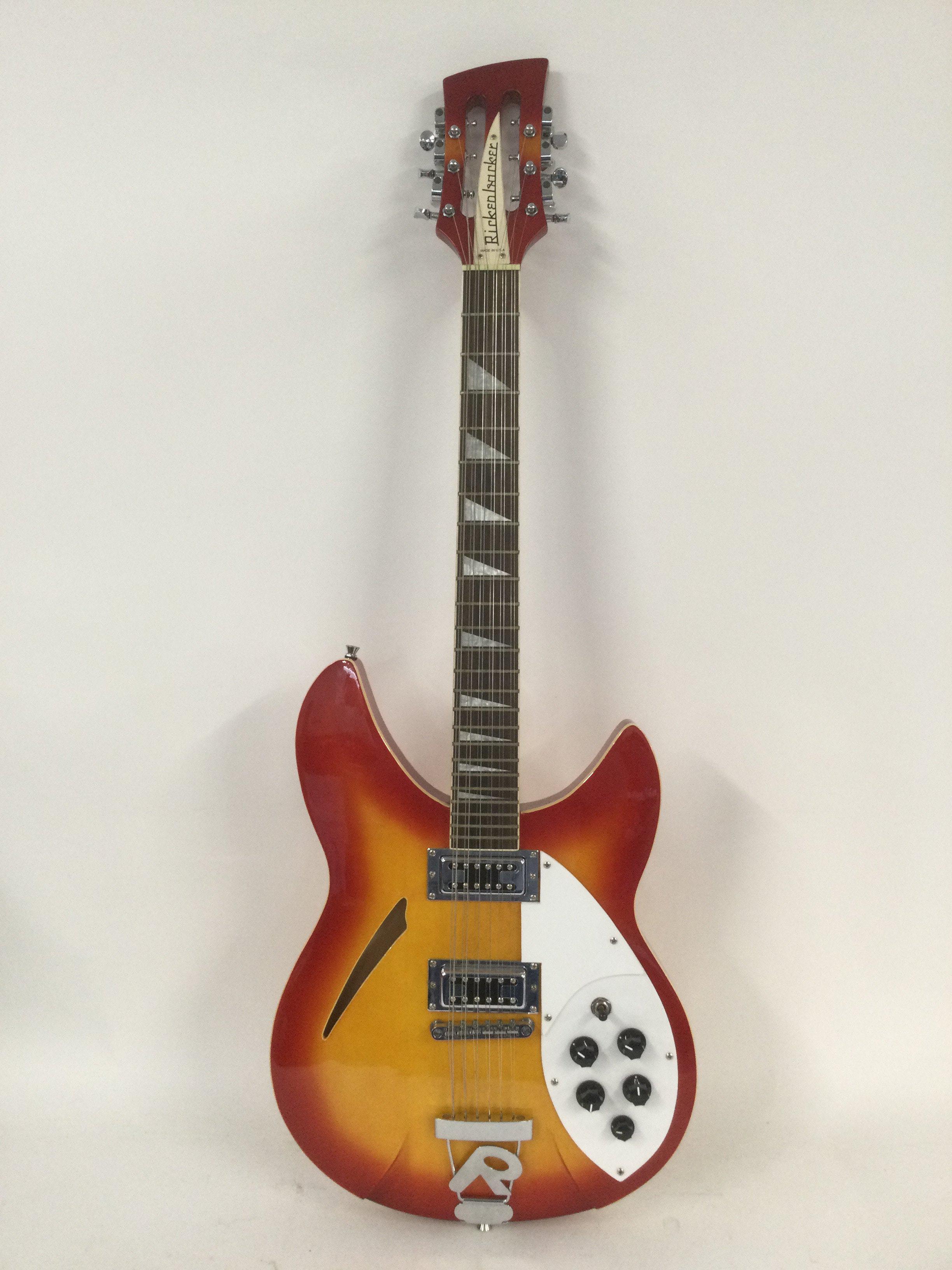 A late 1970s/80s Chinese copy of a Rickenbacker 360 12 string electric guitar. Comes with a Black Rat hard carry case.