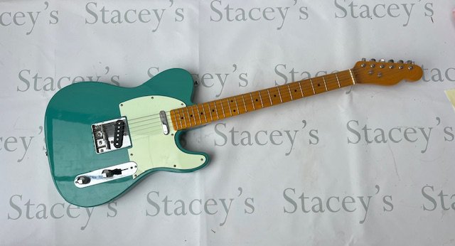 Scratch built T Type partscaster with aged pickguard, chrome parts and maple fingerboard in good overall condition. No case.