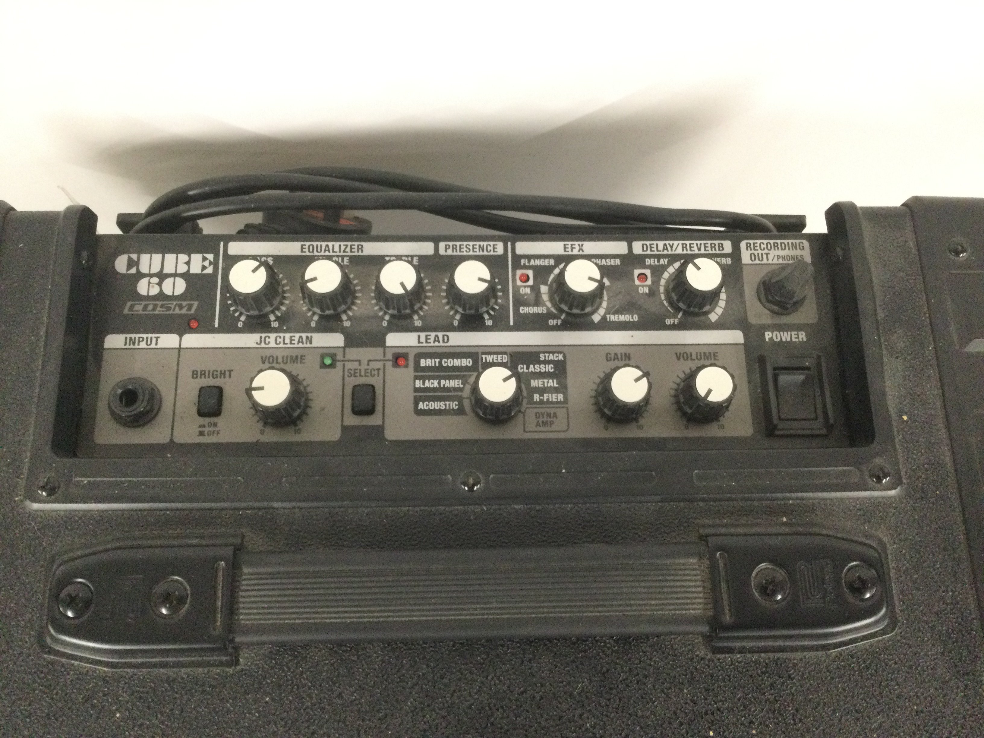 A Roland Cube 60 amplifier.