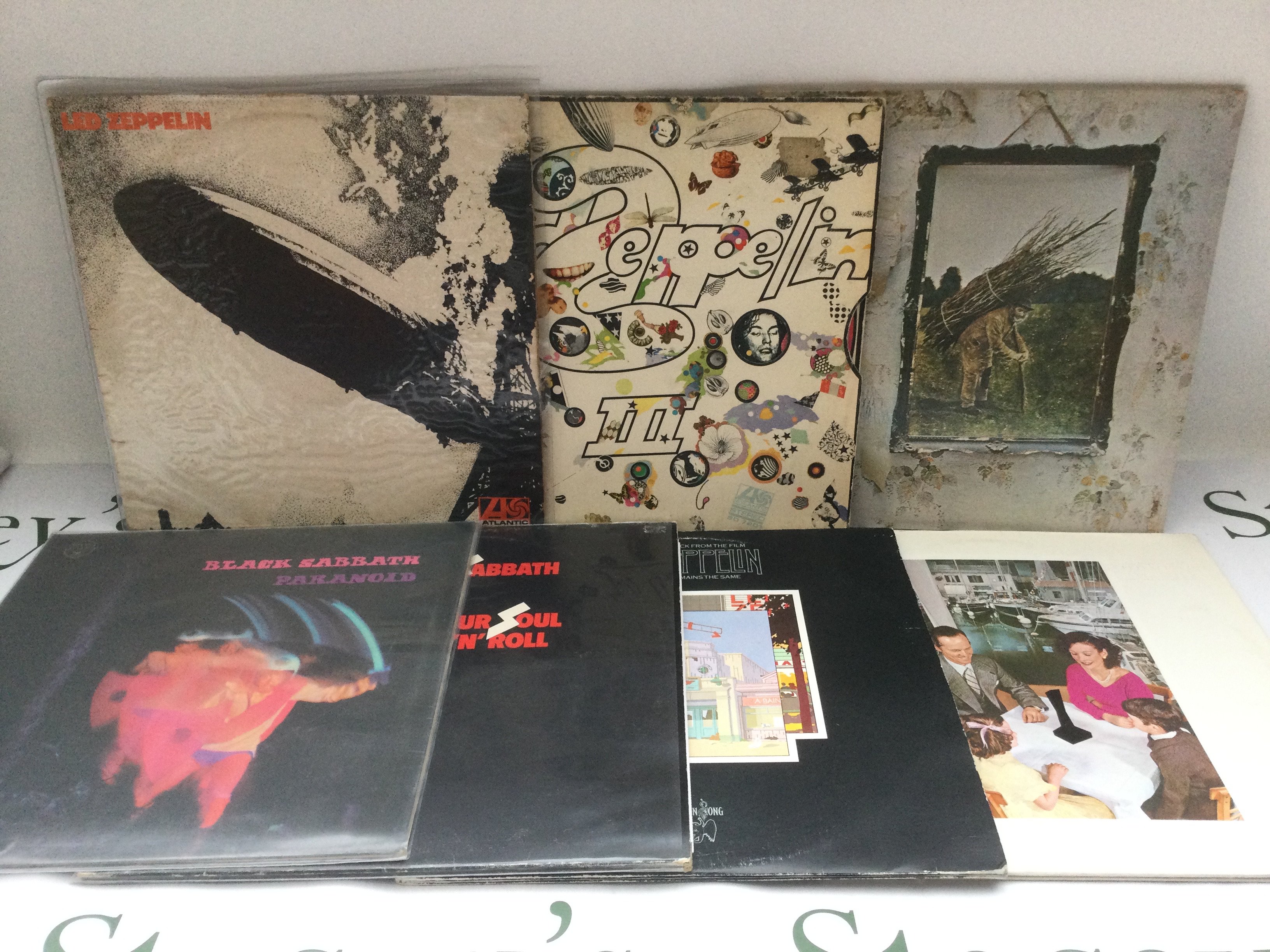 Seven LPs by Led Zeppelin and Black Sabbath, no red/plum Atlantic labels, comprising Led Zeppelin I, III, IV, Paranoid and others.