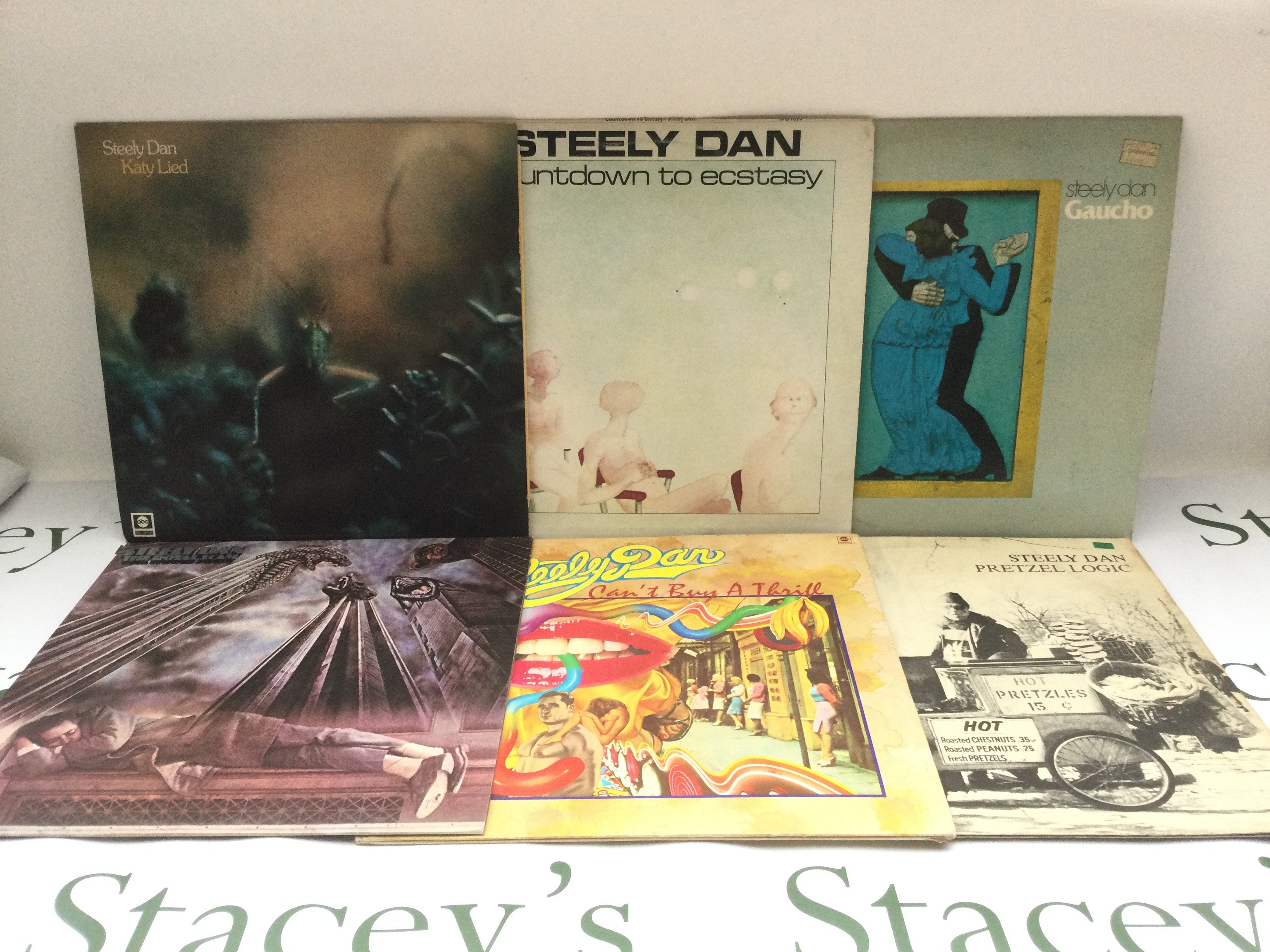 Six Steely Dan LPs comprising 'Pretzel Logic', 'Countdown To Ecstasy' and others.