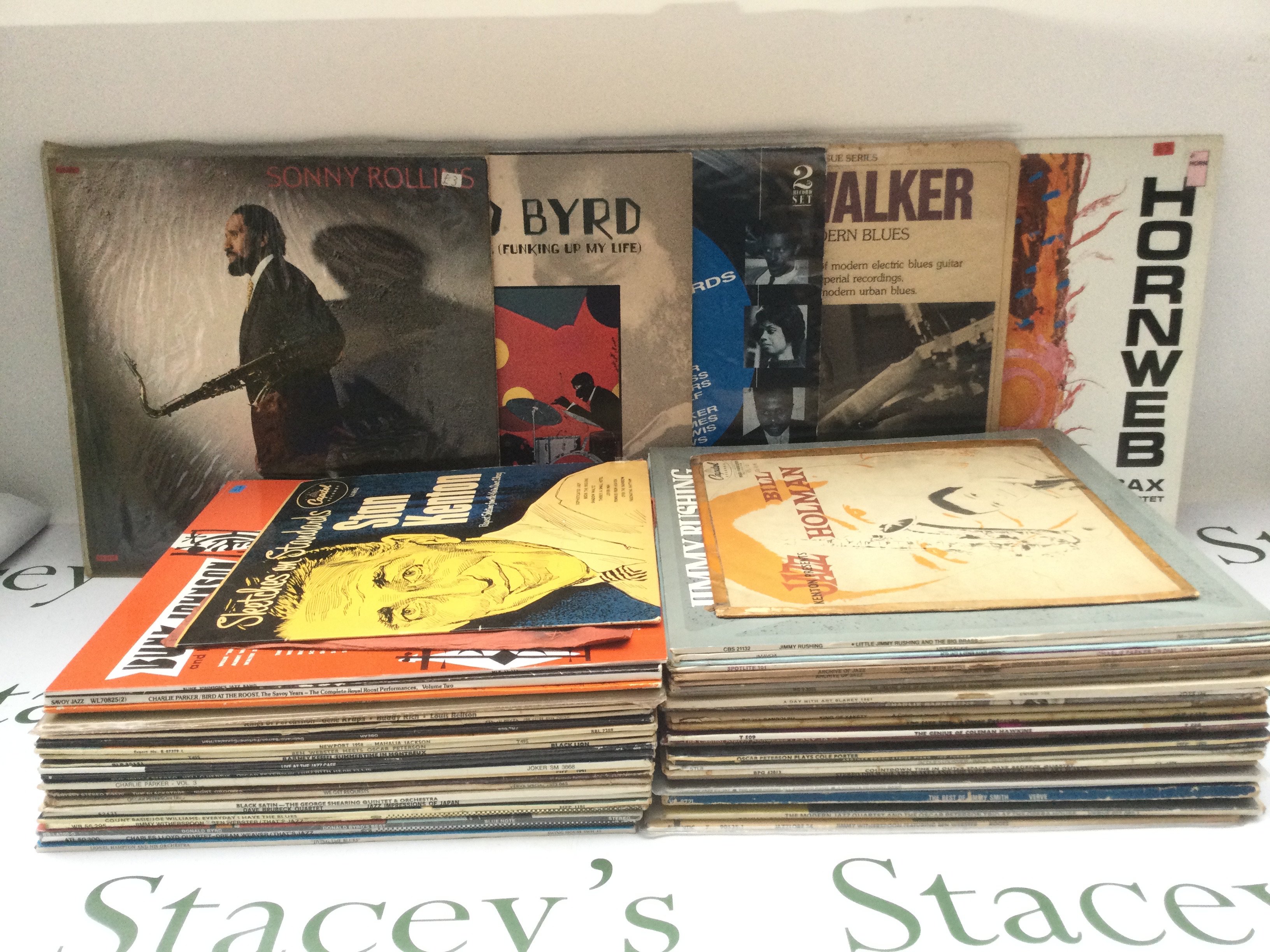 A collection of jazz LPs by various artists including Sonny Rollins, Donald Byrd, Jimmy Smith and others.
