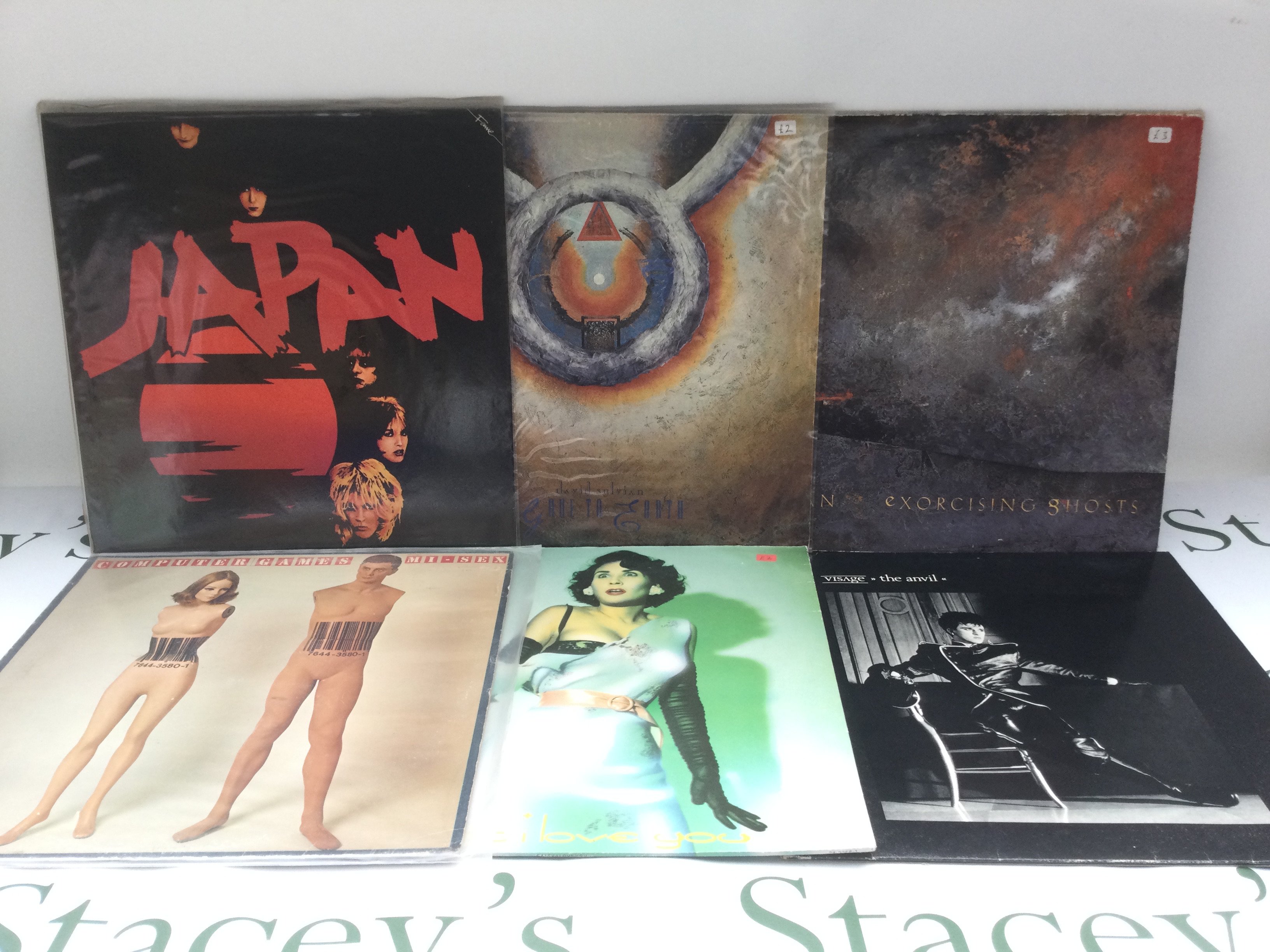 Twelve new wave and electro LPs by various artists including Japan, Tubeway Army, Visage and others. Includes a promo disc.