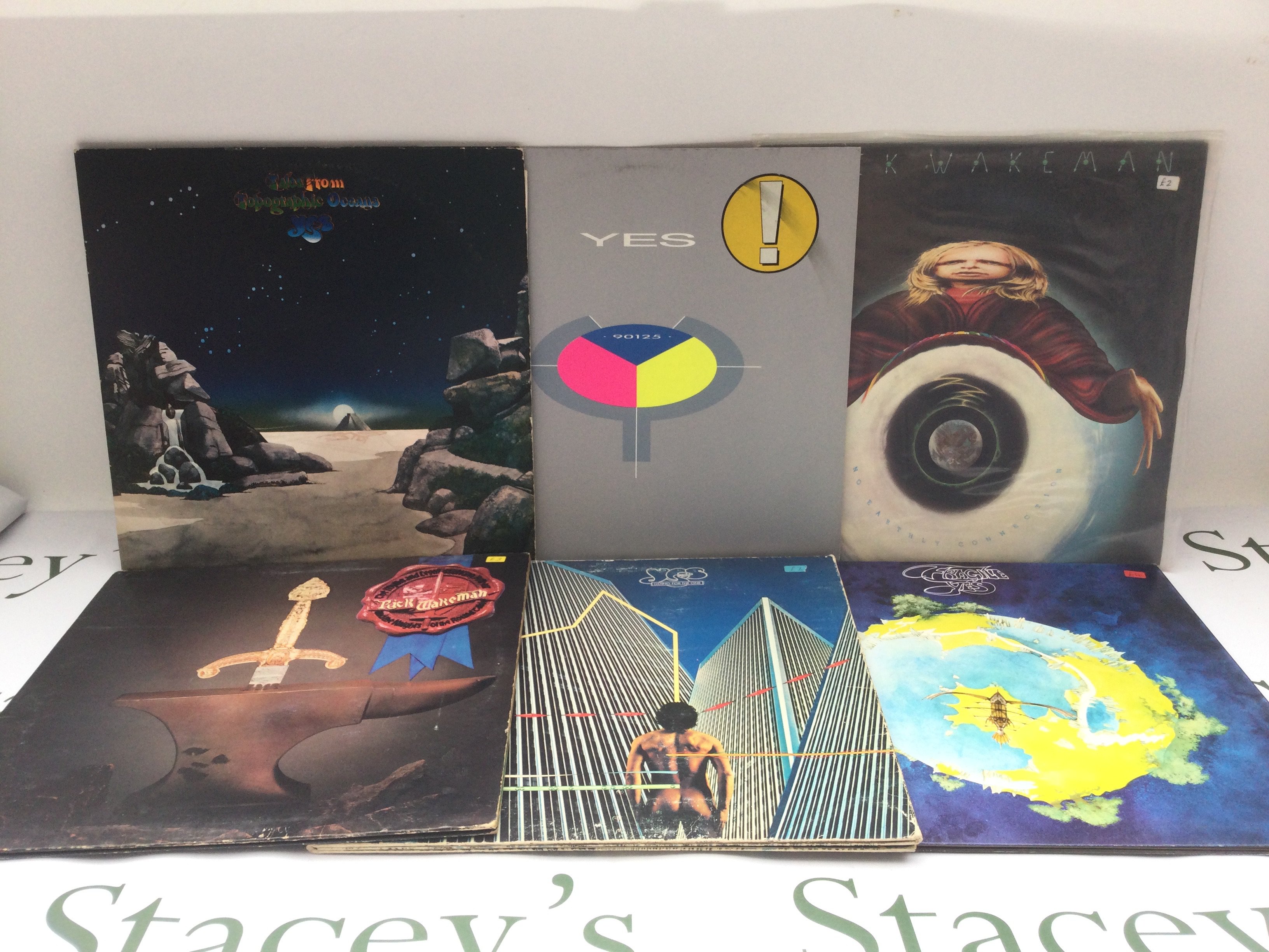 Six Yes and solo LPs comprising 'Fragile', 'Tales From Topographic Oceans' and others.