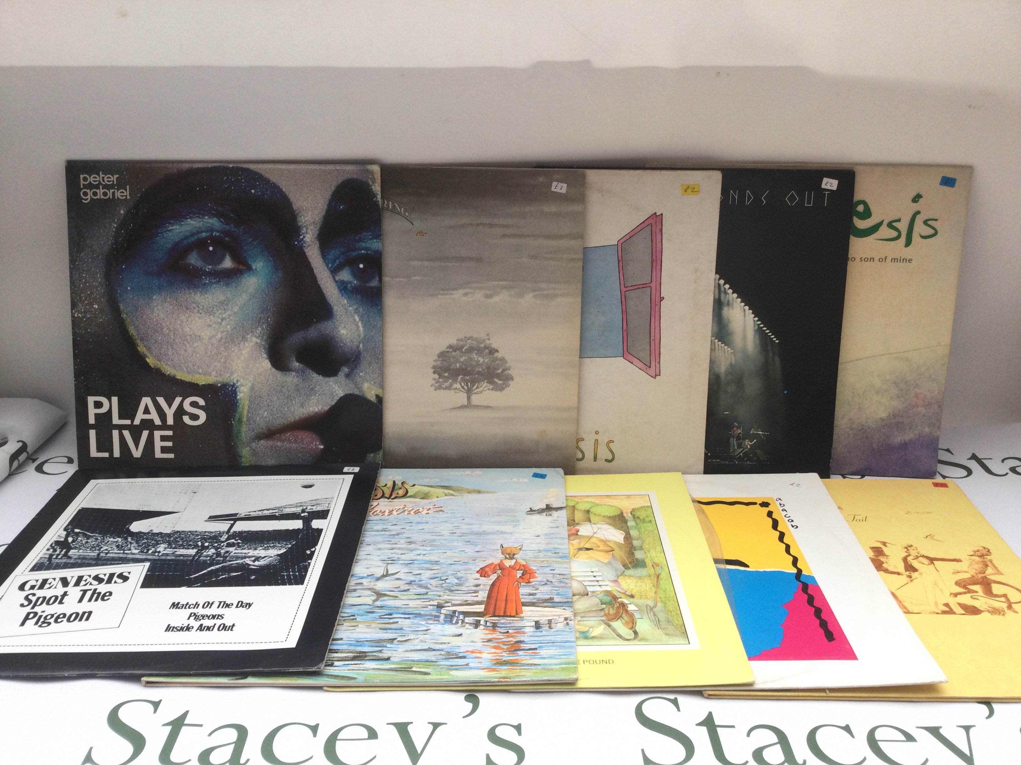 Ten Genesis LPs and 12" singles comprising 'A Trick Of The Tail', 'Foxtrot', 'Selling England By The Pound' and others.